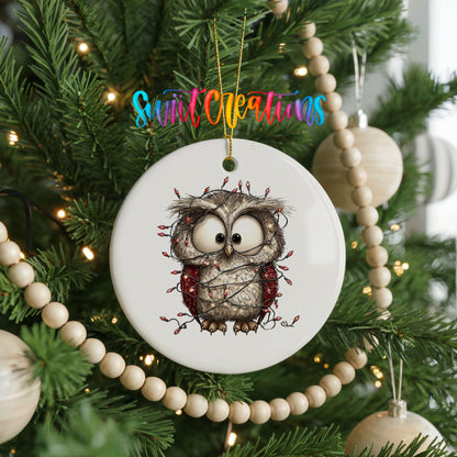 woodland owl wrapped in colorful Christmas lights ceramic Christmas ornament hanging on a green Christmas tree