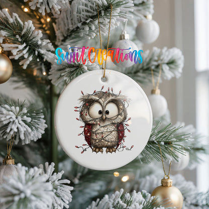 woodland owl wrapped in colorful Christmas lights ceramic Christmas ornament hanging on a frosted Christmas tree