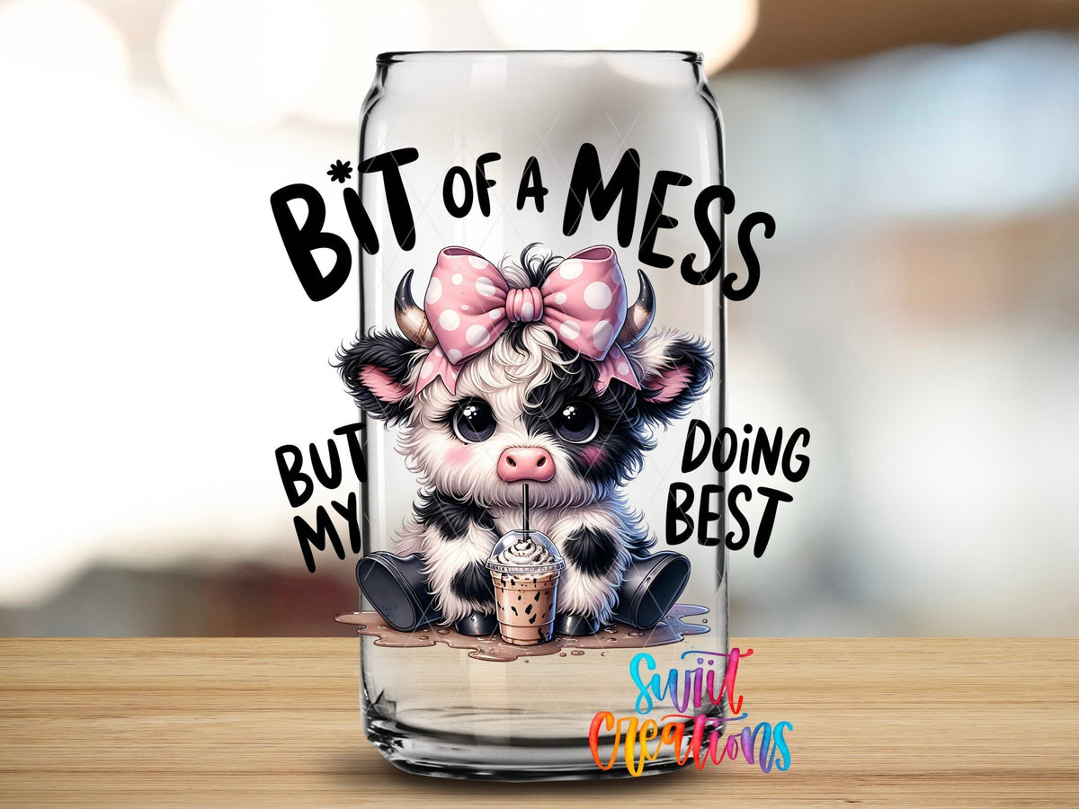 A Bit of A Mess But Doing My Best Cute Cow UV DTF transfer applied to a clear glass can from Swiit Creations