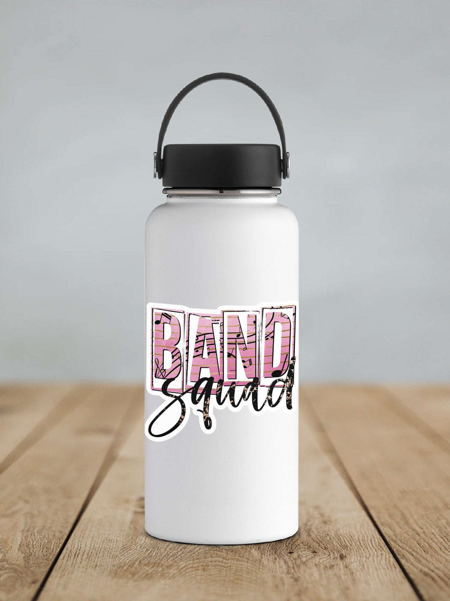 a white water bottle sitting on top of a wooden table