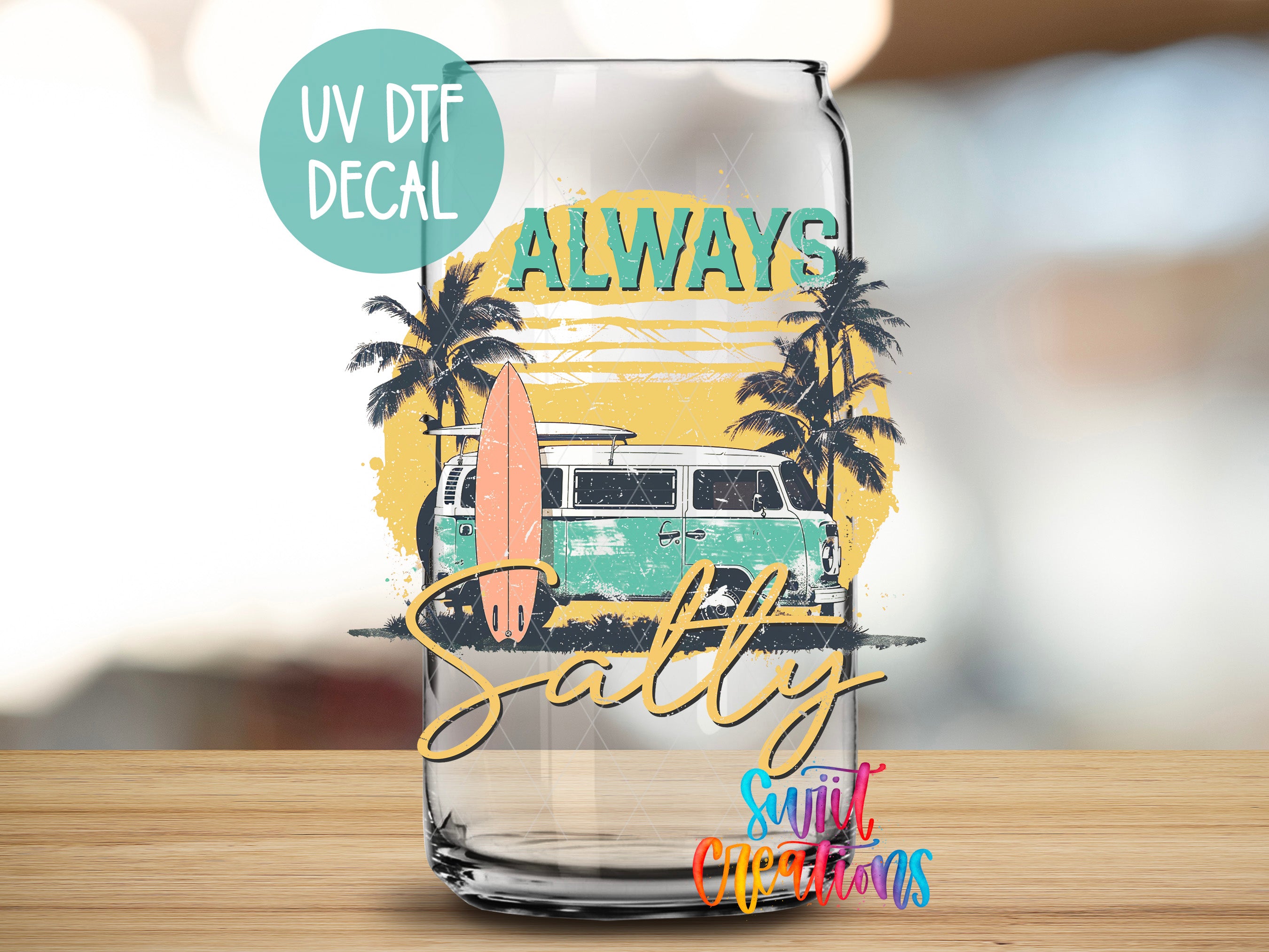 a glass with a picture of a van and palm trees