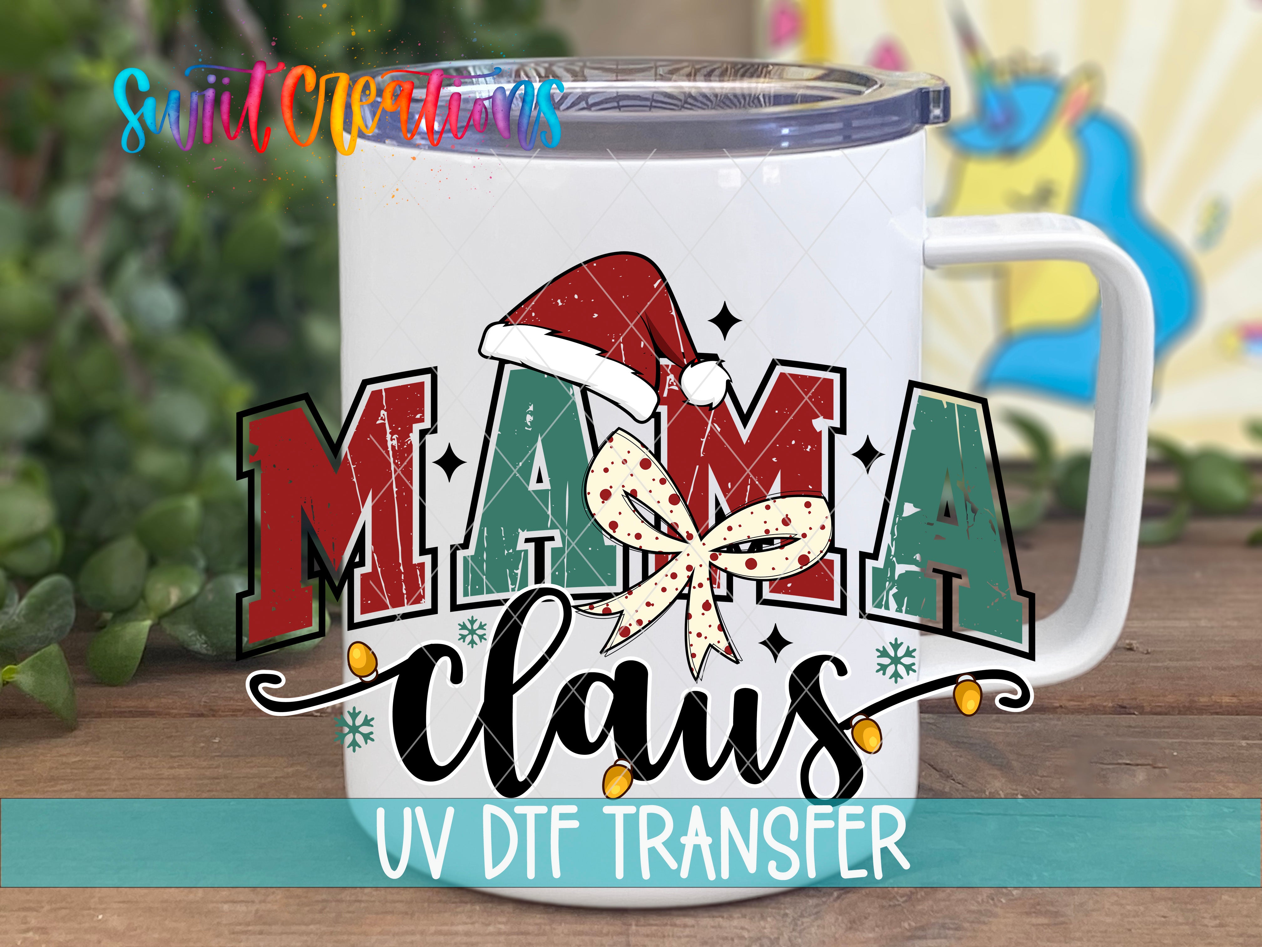 A white mug with a colorful design featuring the text "MAMA Claus" and a Santa hat, along with decorative elements such as snowflakes and stars.