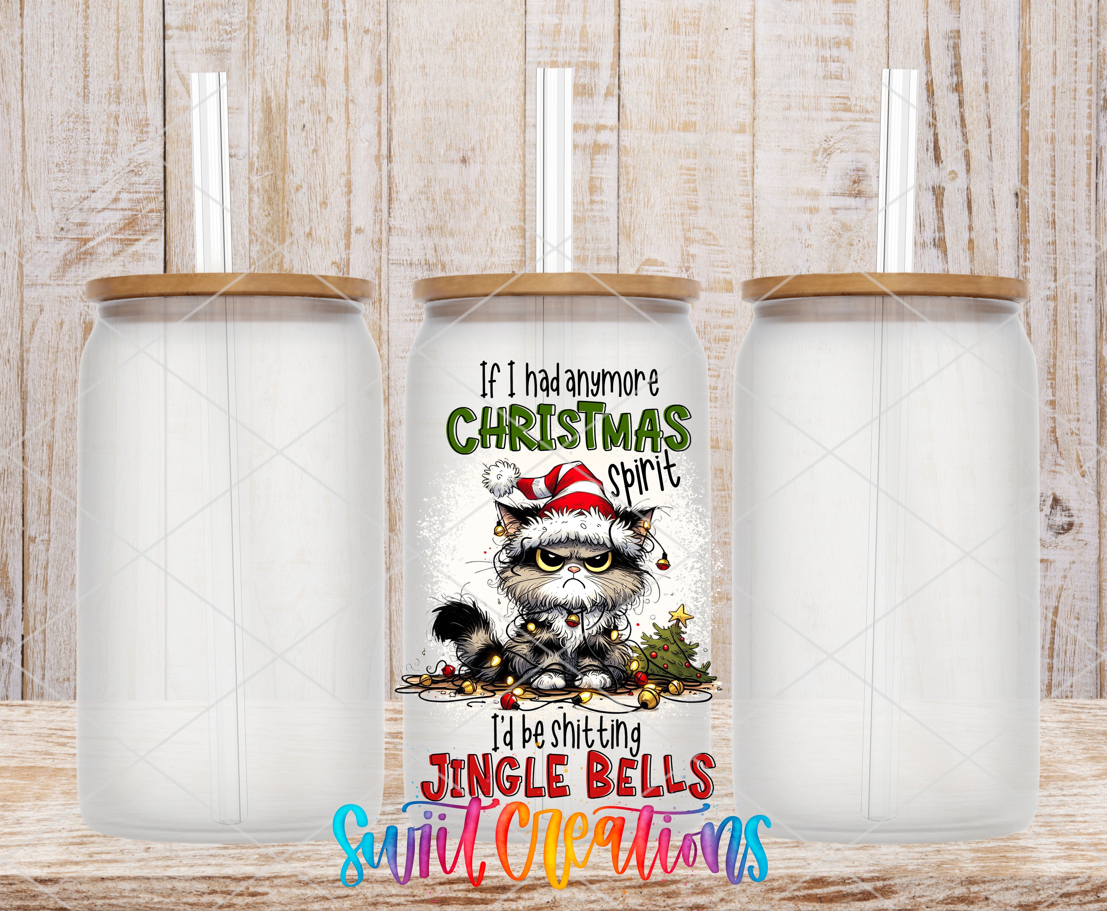 a can with a Christmas-themed design, including a cat wearing a Santa hat and the text "If I had any more Christmas spirit, I'd be shitting Jingle Bells".