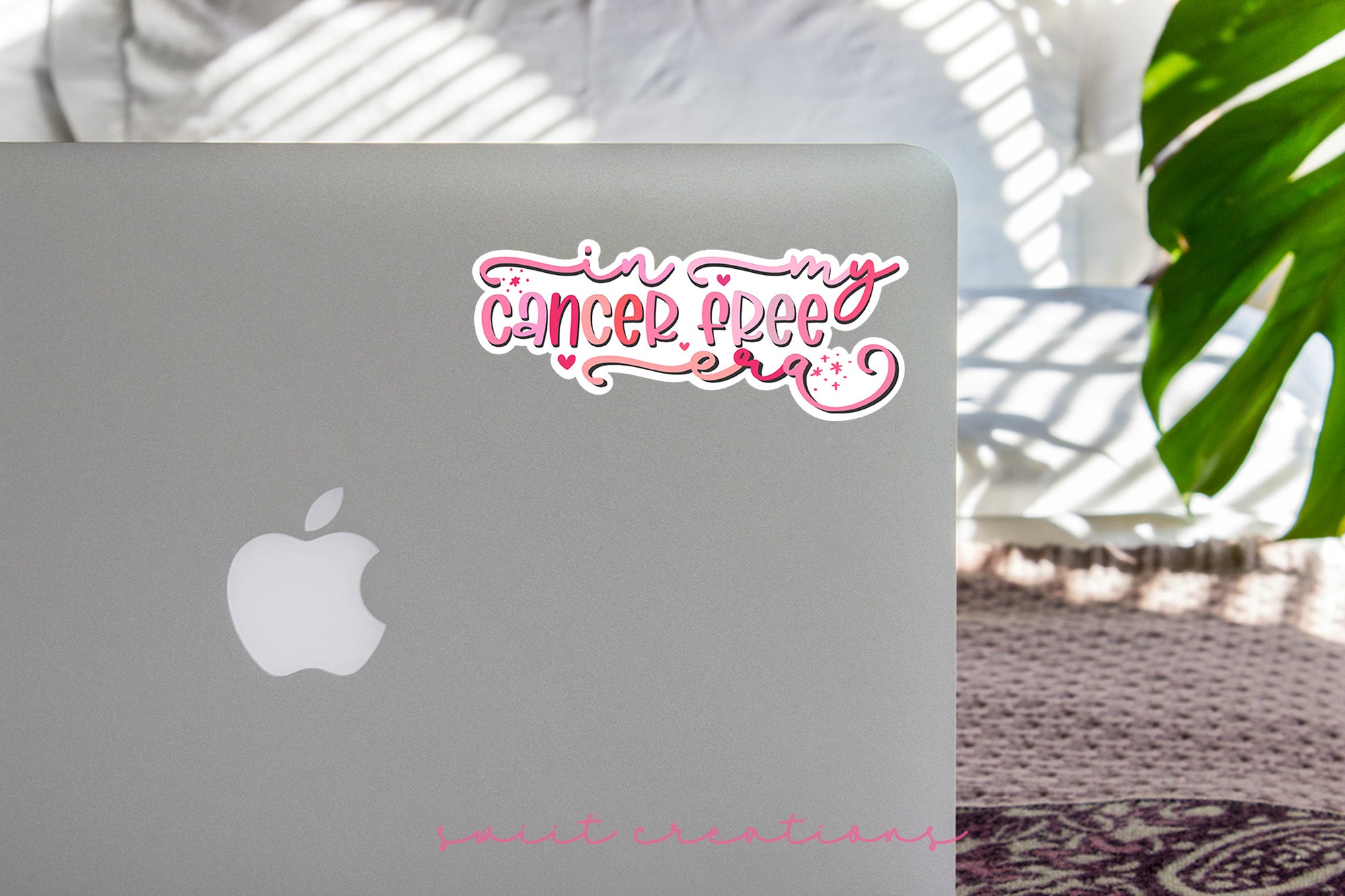 a laptop computer sitting on top of a table