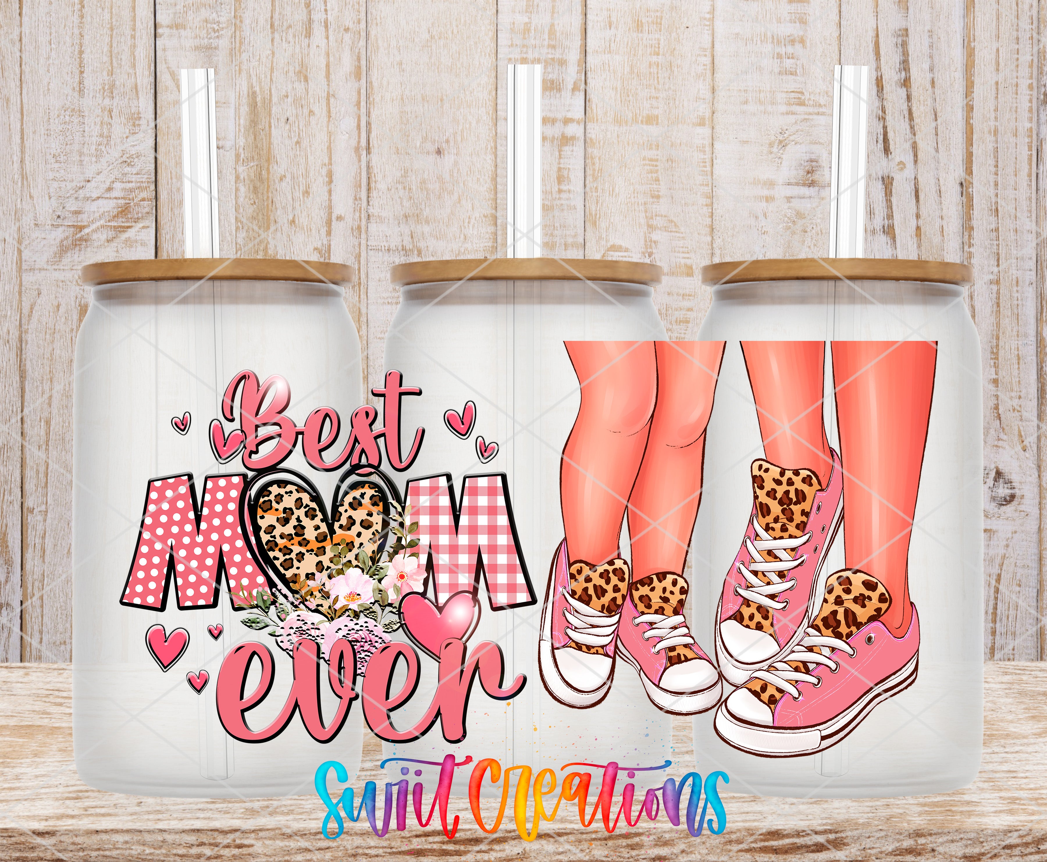 A set of three glass tumblers with a design featuring a mother and child, along with the text "Best Mom Ever" and leopard print sneakers.