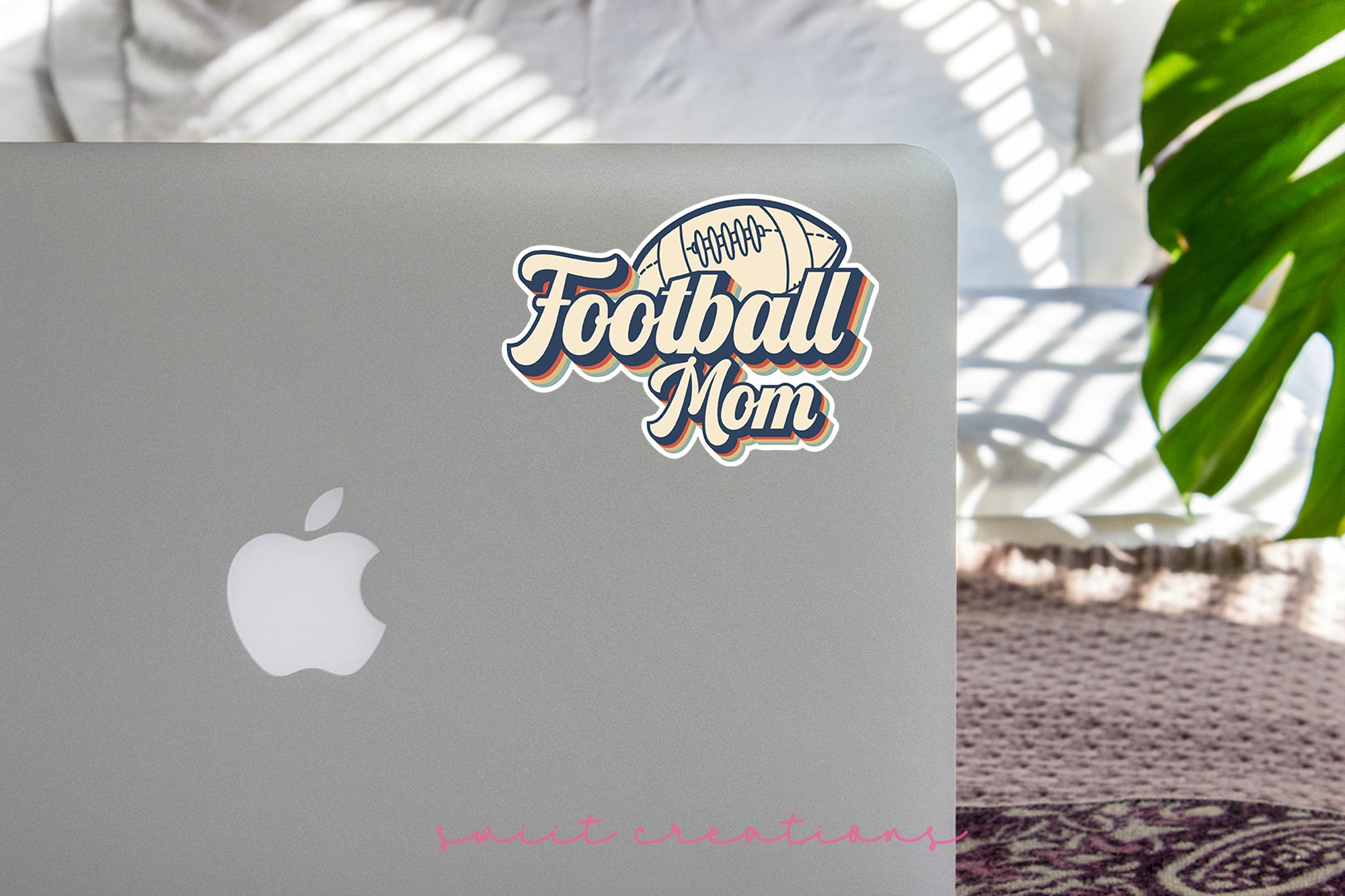 a laptop computer sitting on top of a table