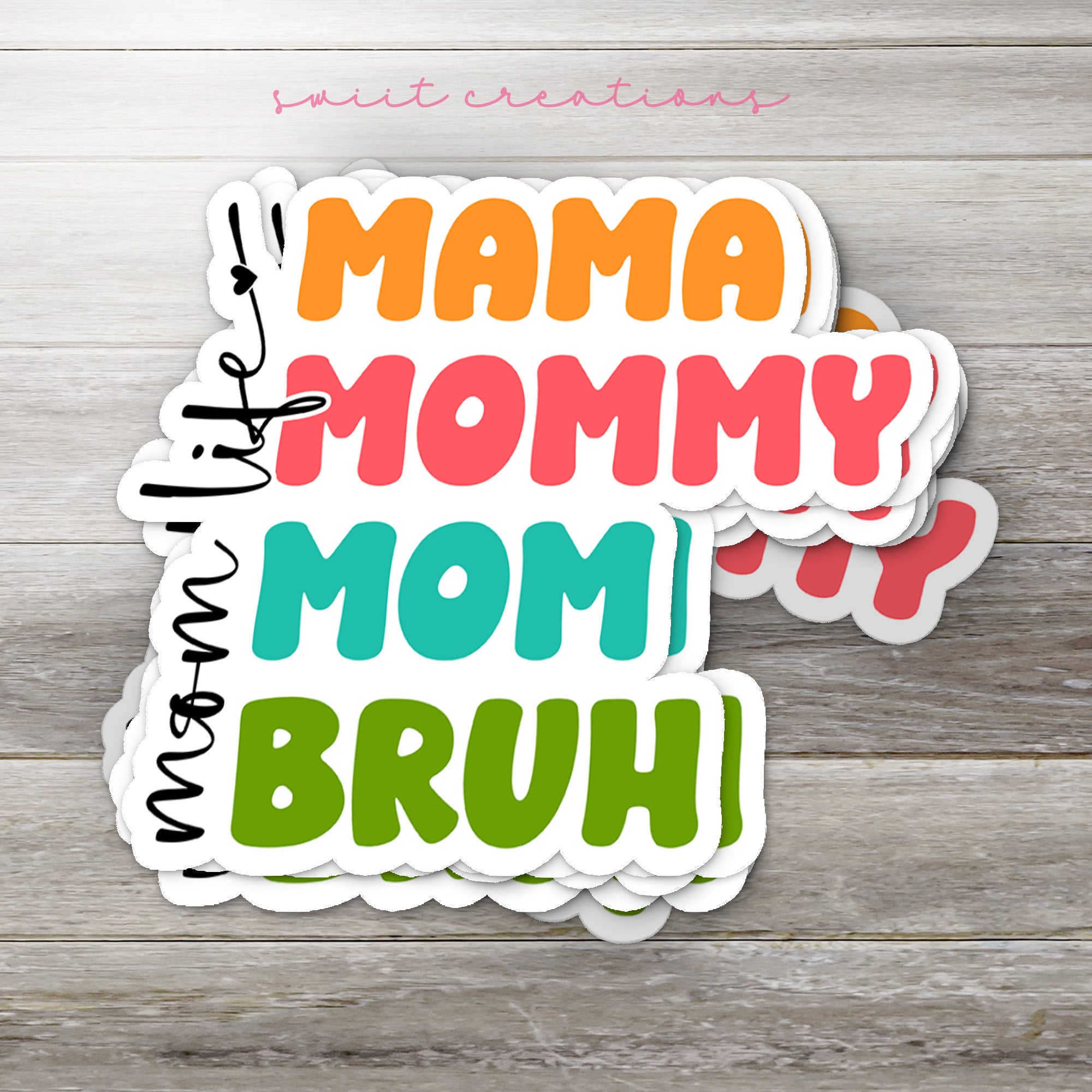 a close up of a sticker on a wooden surface