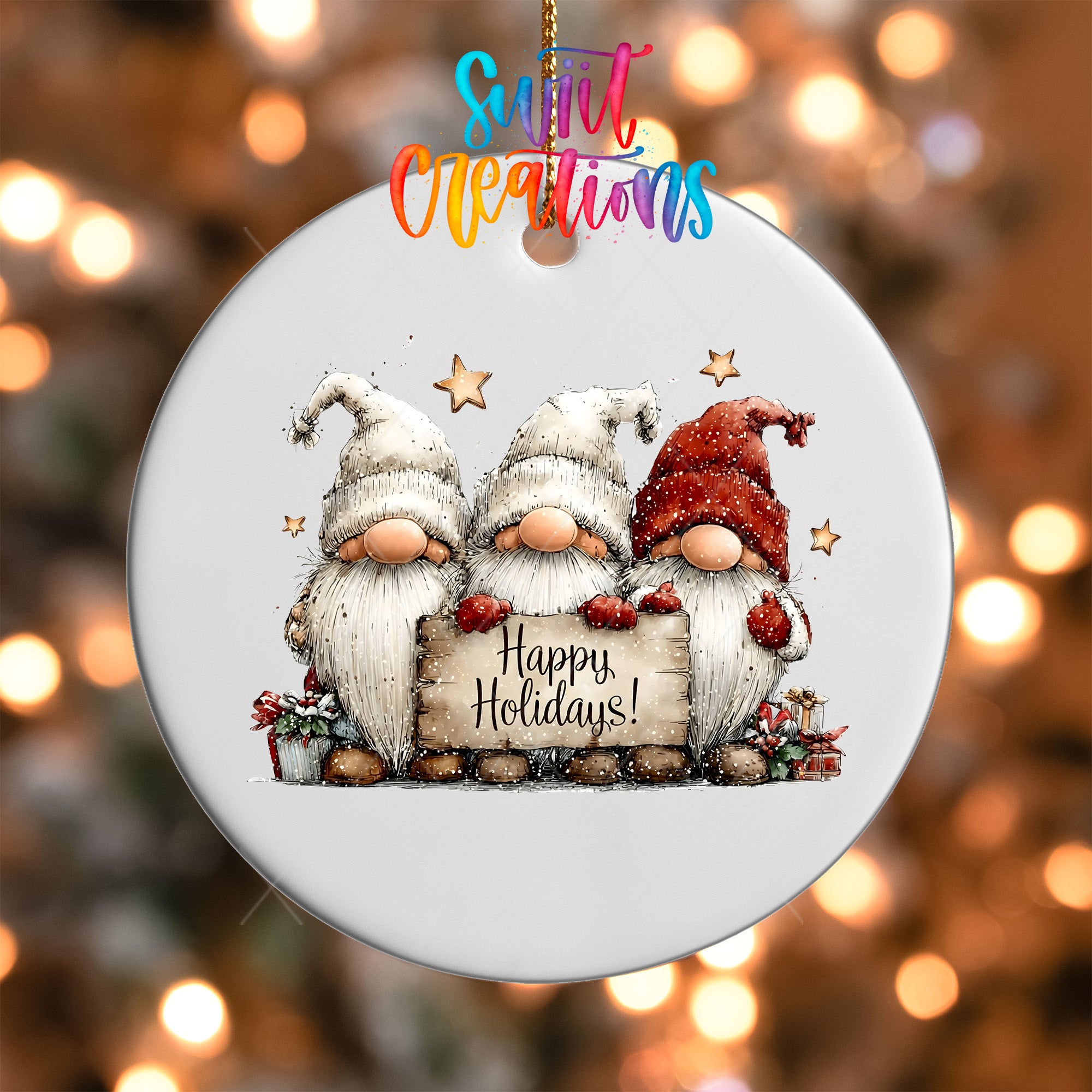 A white ornament with a festive design featuring three gnomes holding a sign that says "Happy Holidays!" against a background of twinkling lights.