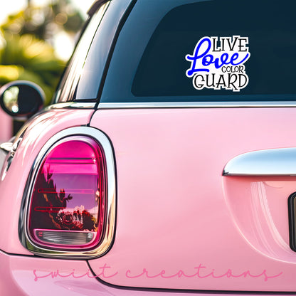 a pink car that has a sticker on it