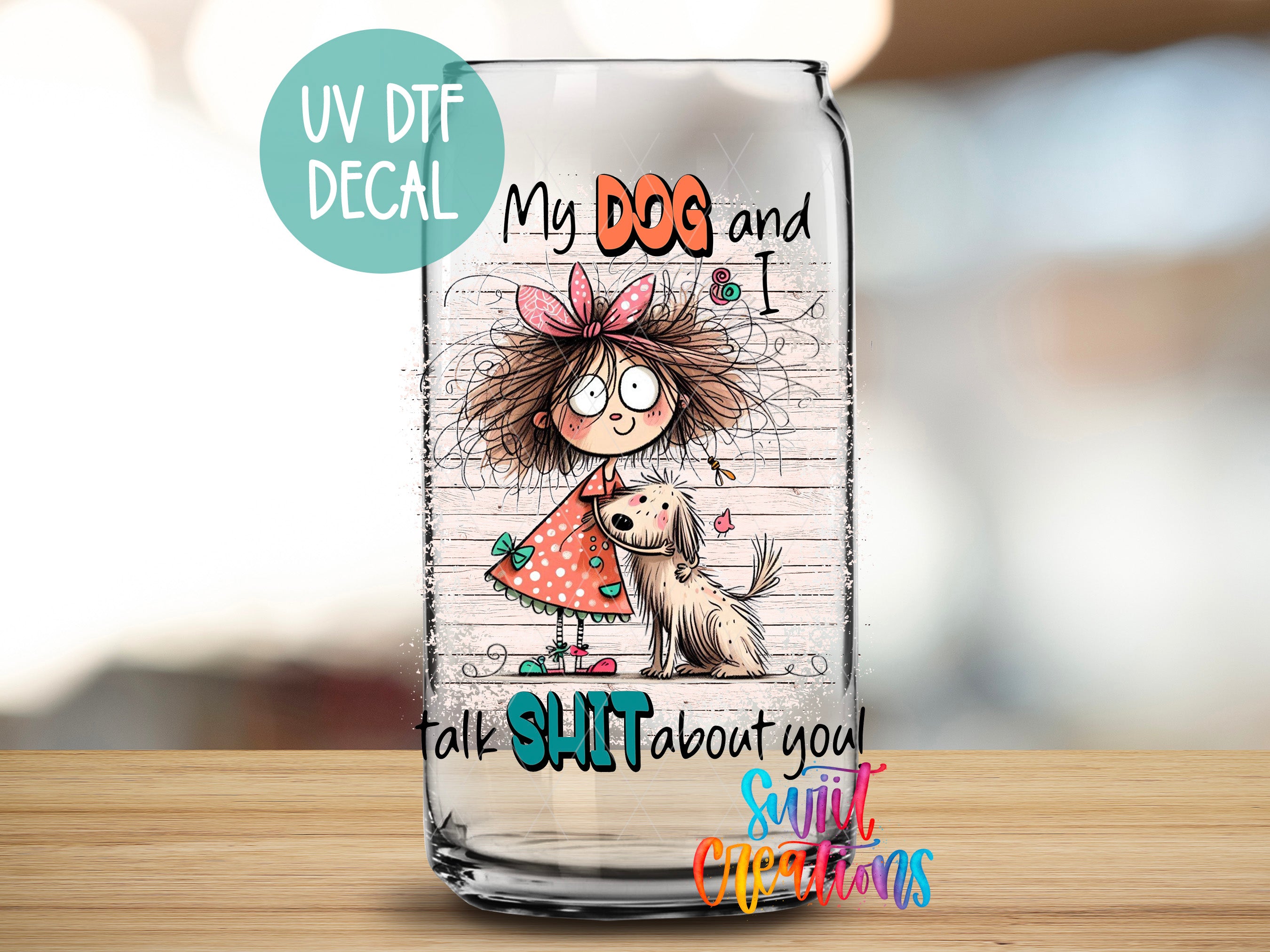 a glass with a picture of a girl and a dog on it