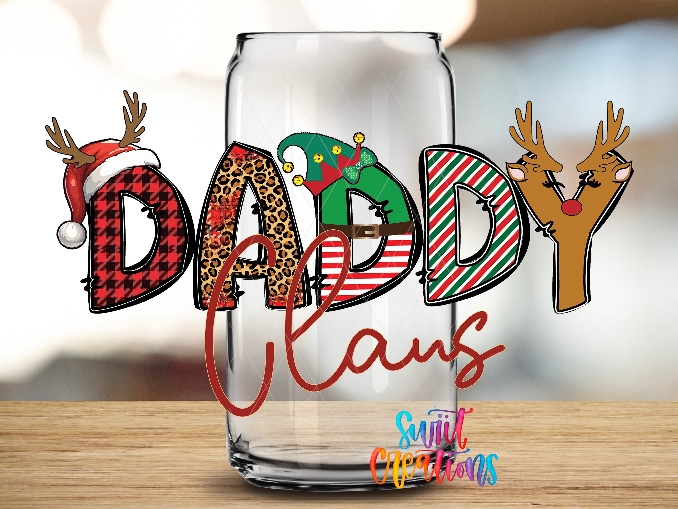 A glass can with the word "DADY" written on it, along with various Christmas-themed decorations such as reindeer and Santa hats.