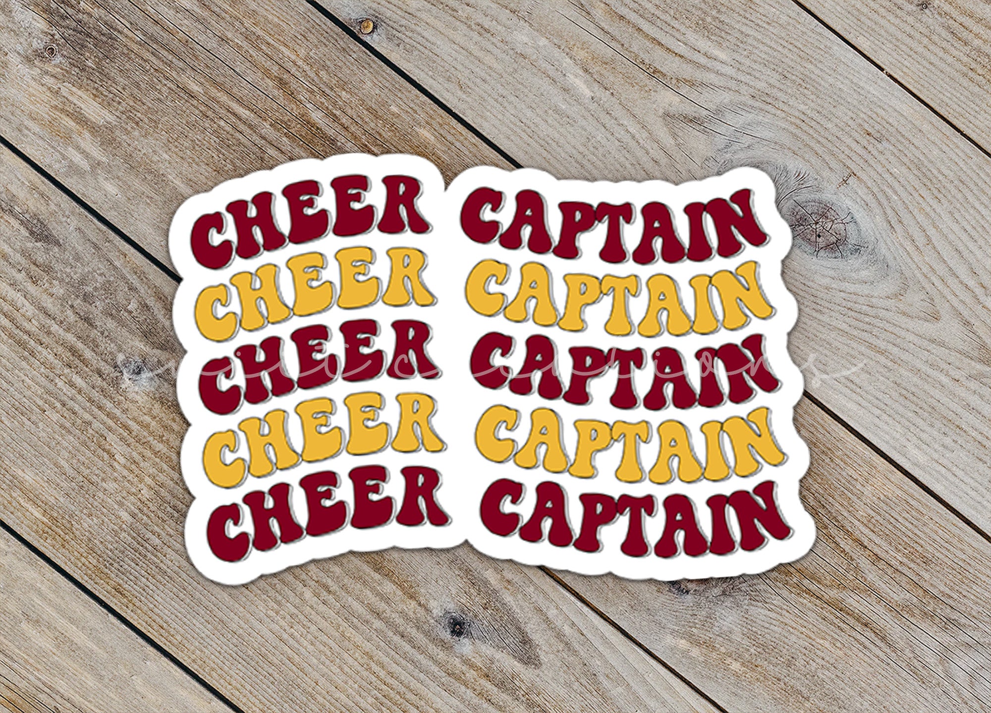 a pair of stickers that say cheer captain and cheer captain