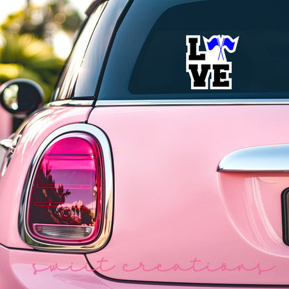 a pink car with a sticker that says love