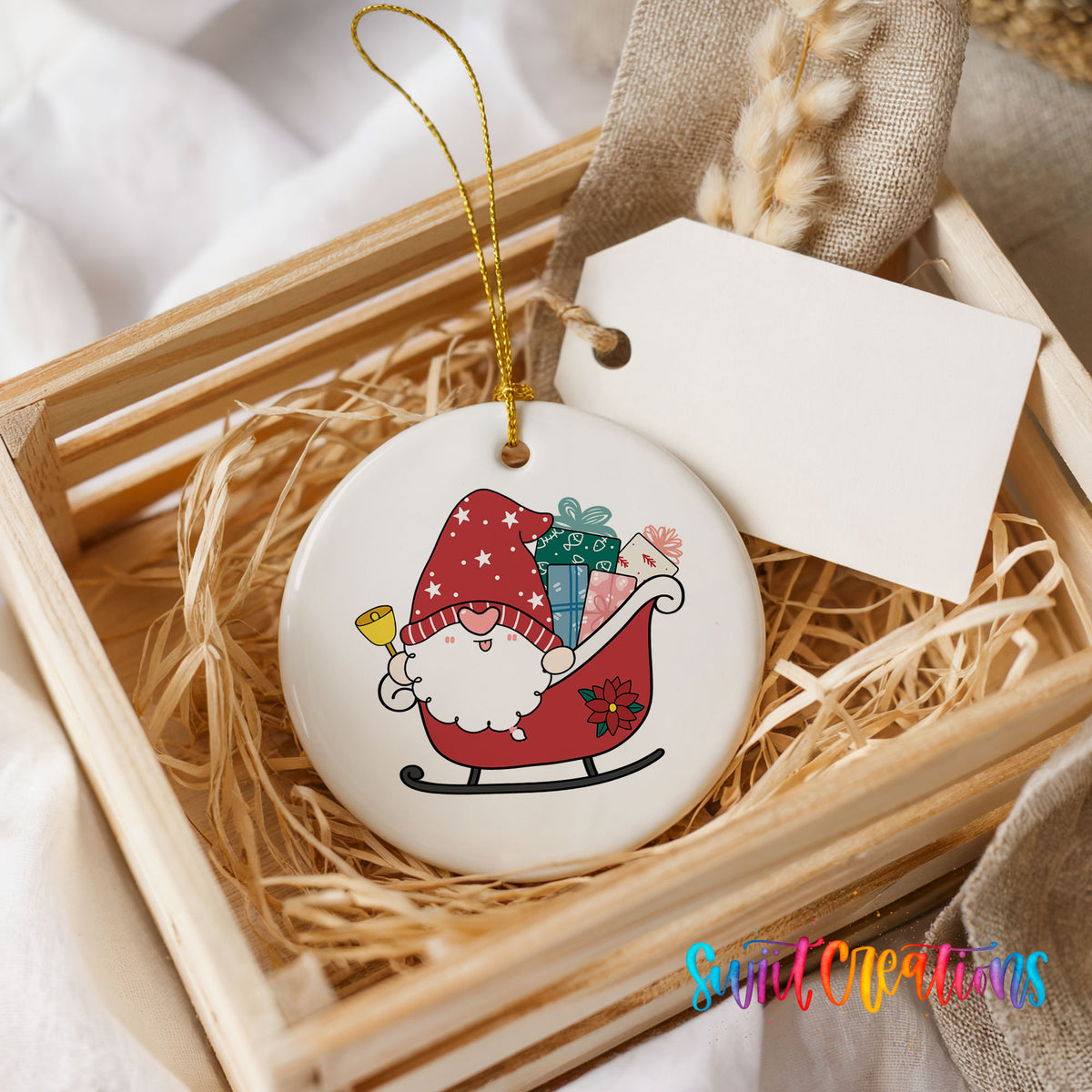 A ceramic ornament in a wooden crate, featuring a gnome riding a sled and holding presents.