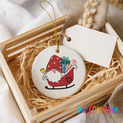A ceramic ornament in a wooden crate, featuring a gnome riding a sled and holding presents.