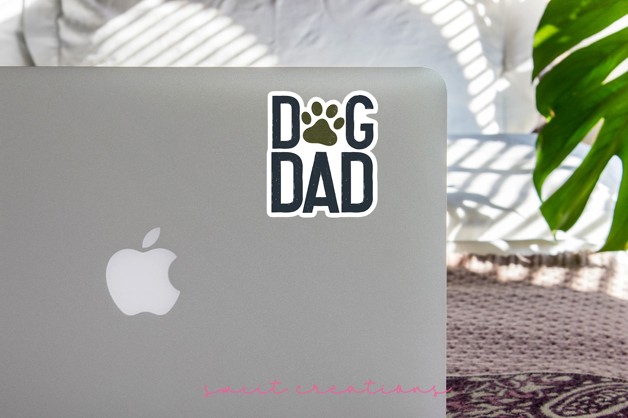 a laptop computer sitting on top of a table