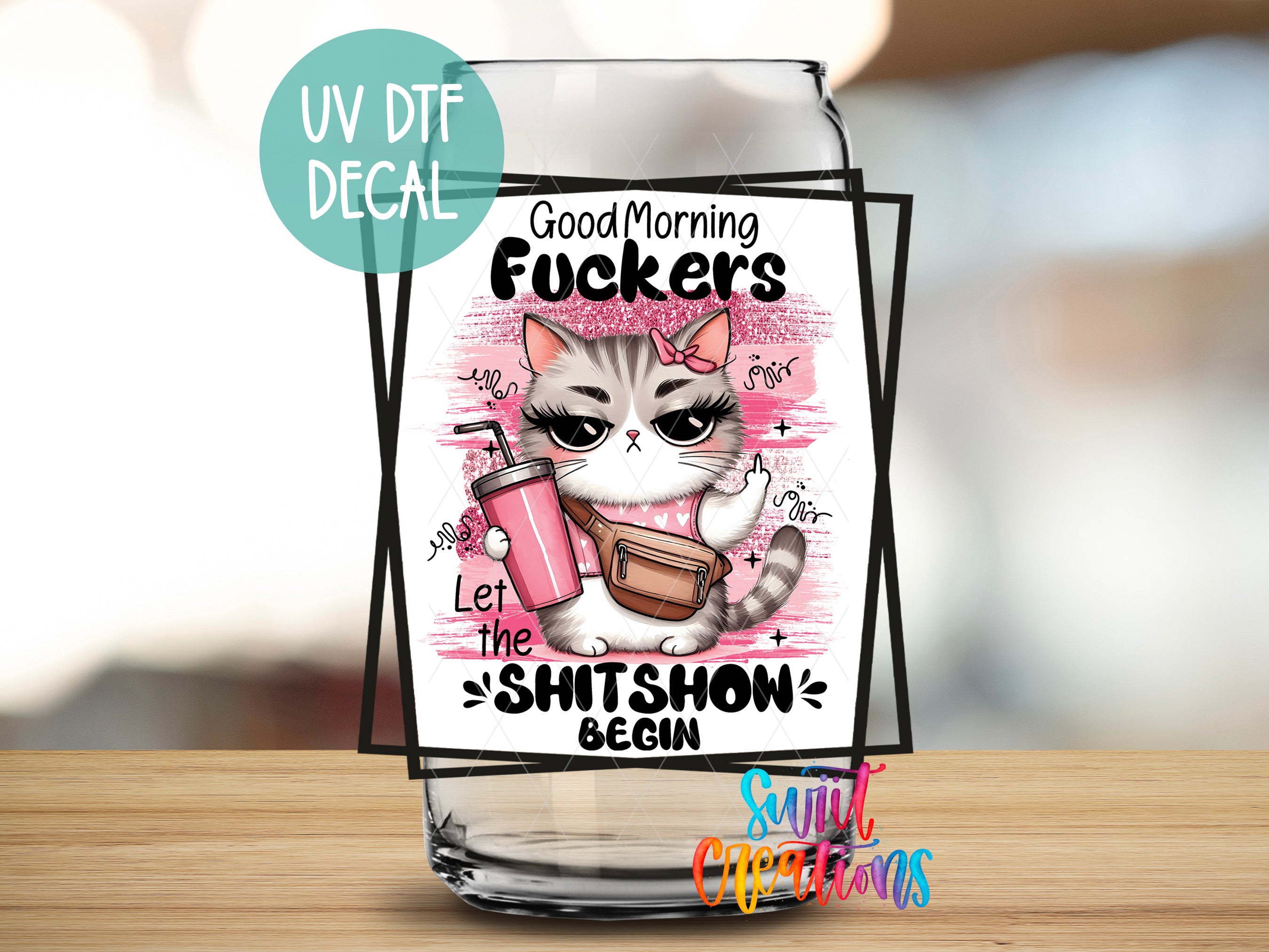 a glass with a picture of a cat on it