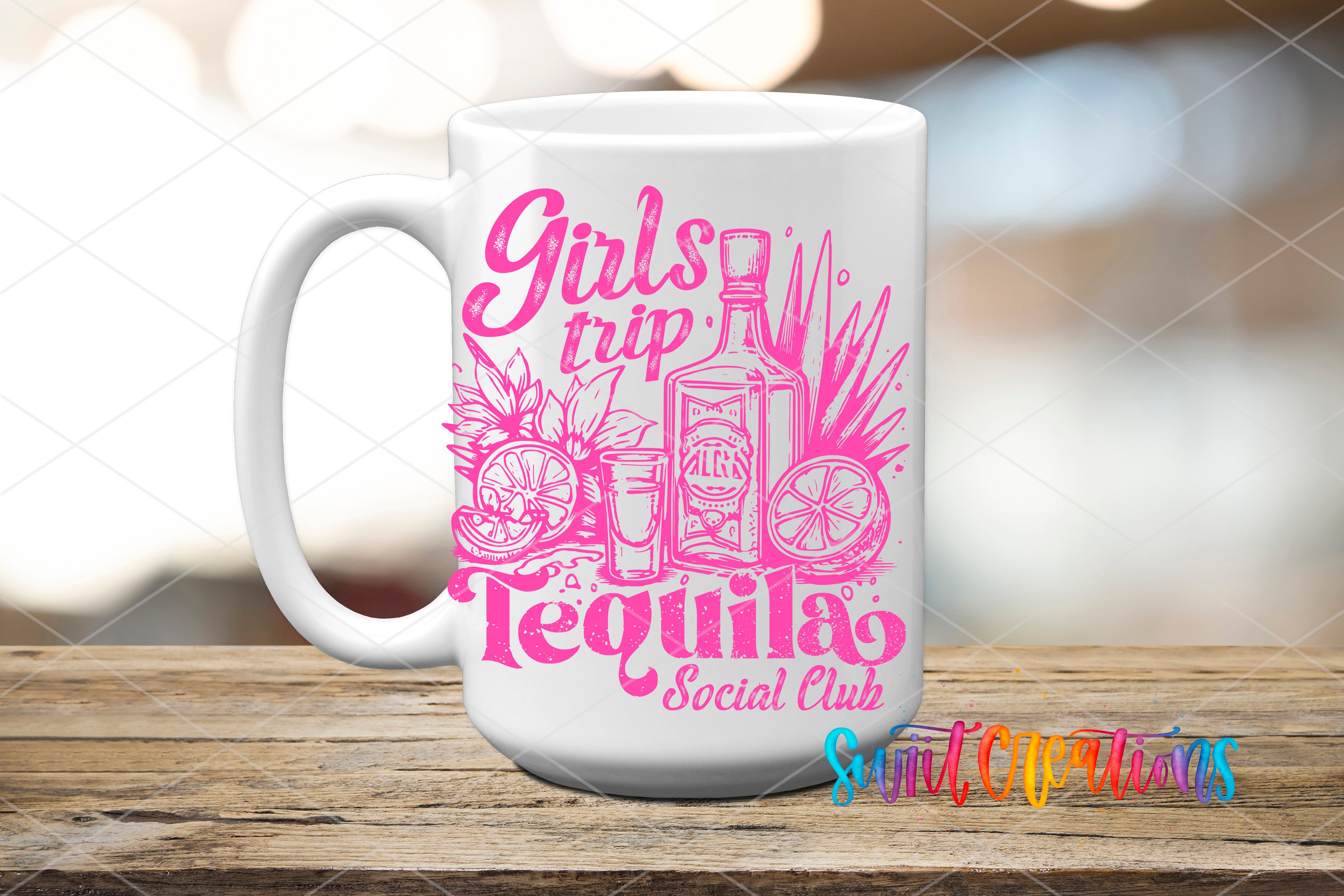 A white mug with a pink design featuring a tequila bottle, a tequila glass, and a lime, along with the text "Girls trip Tequila Social Club" printed on it.