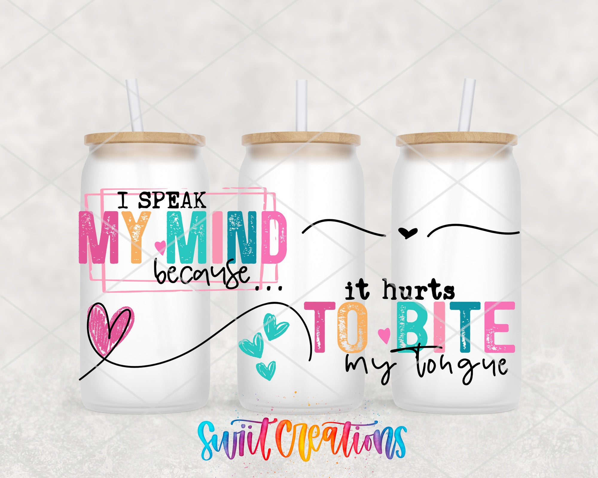 three colorful drink cans with text and heart designs on them.