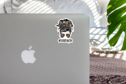 a laptop with a sticker of a gorilla on it