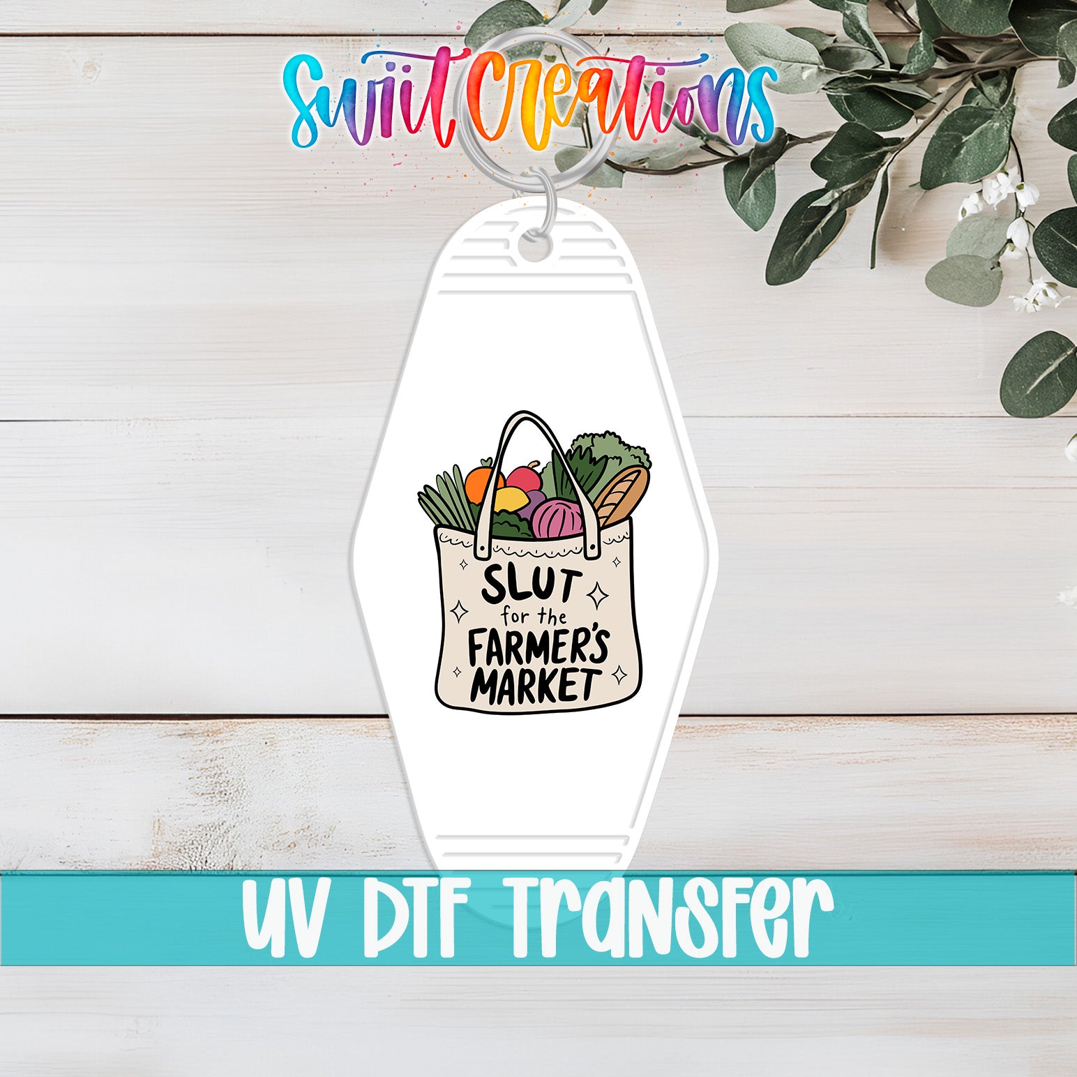 A keychain with a white bag containing various vegetables, along with the text "SLUT for the FARMERS MARKET" printed on it.