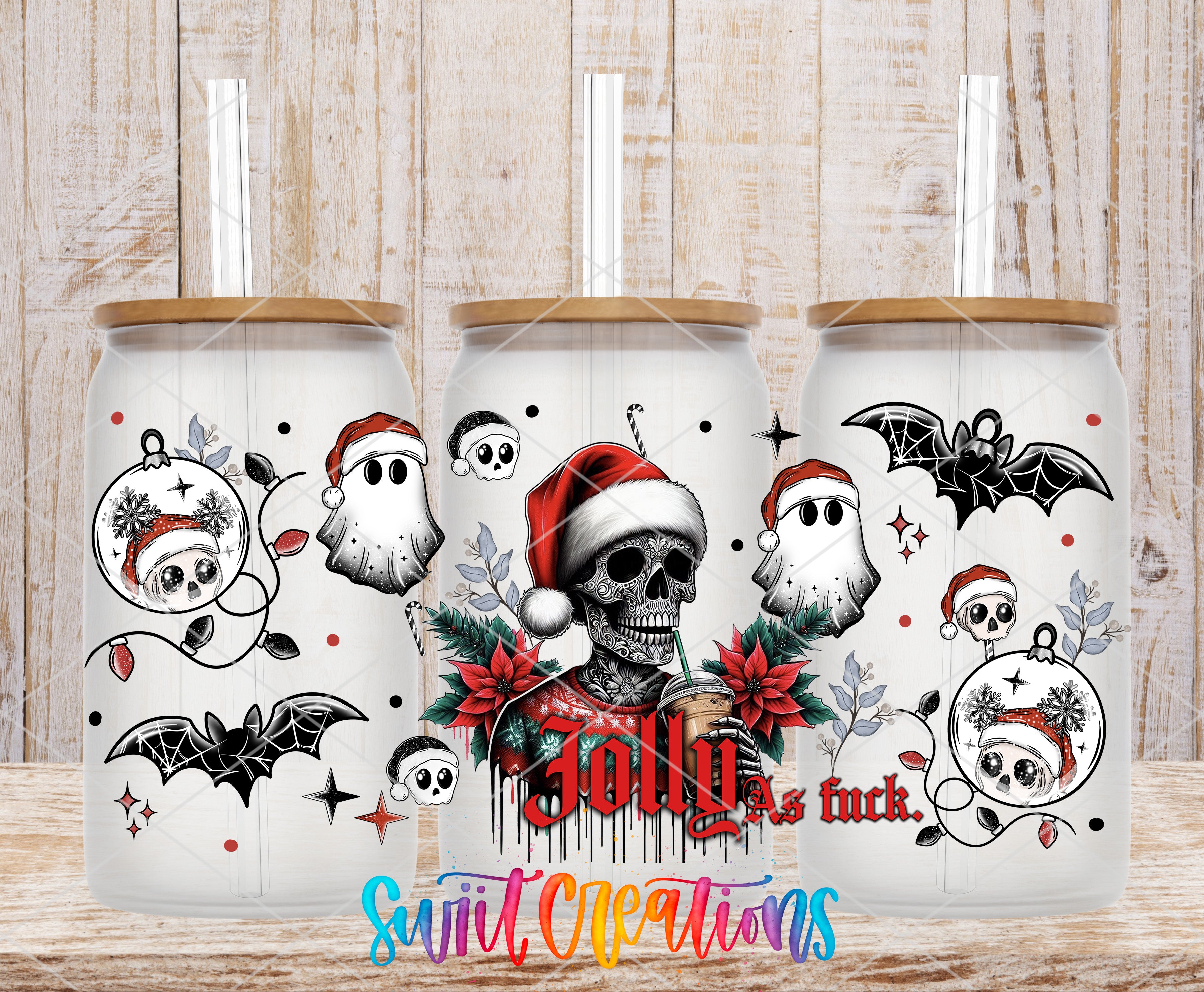 three white tumblers with black and red illustrations and text. The tumblers have a skull and ghost design, along with Christmas decorations such as poinsettias and bats. The text on the tumblers reads "Jolly is tack."