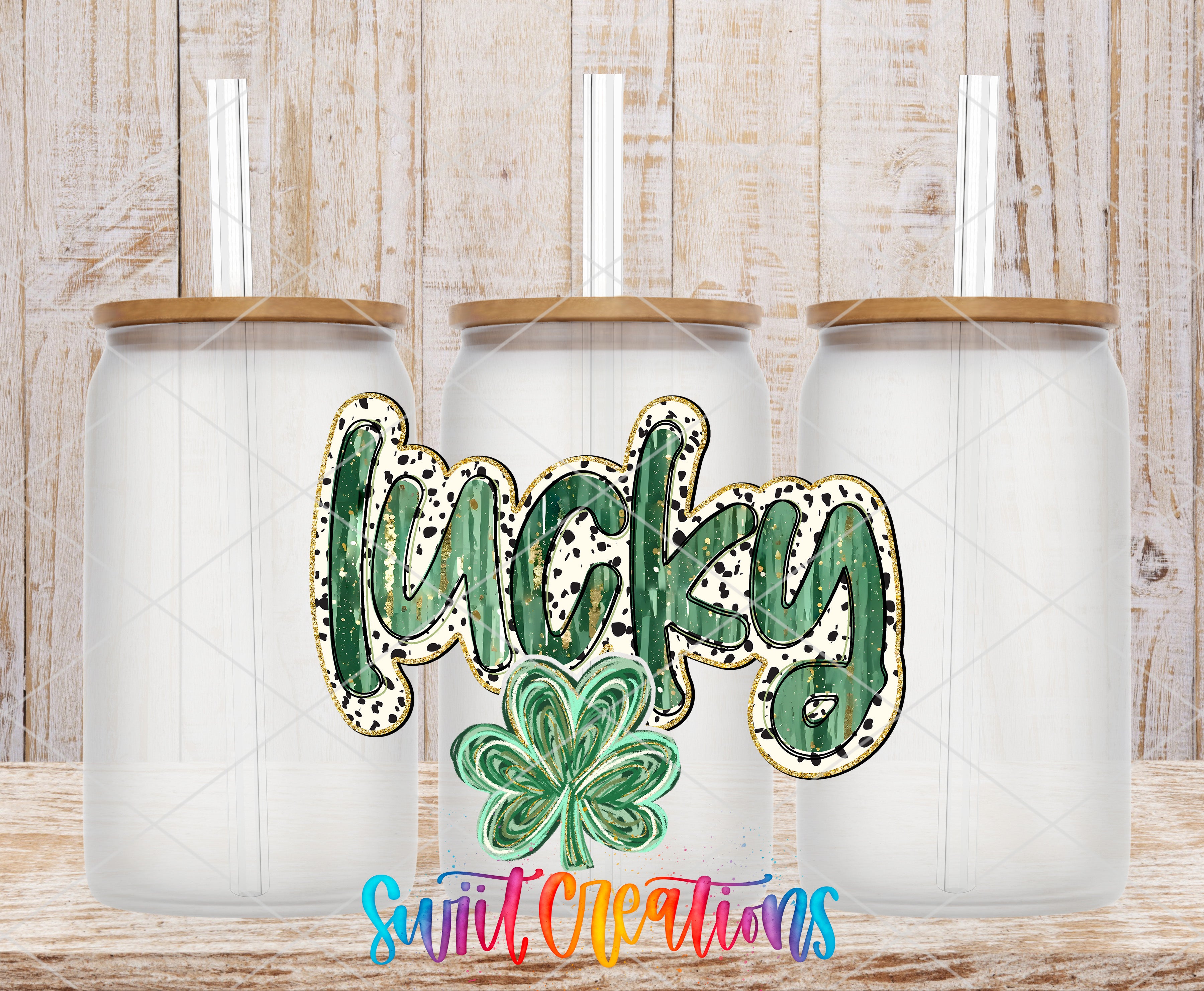 three glass jars with lids, each containing a straw, and a large text design in the center that says "lucky".
