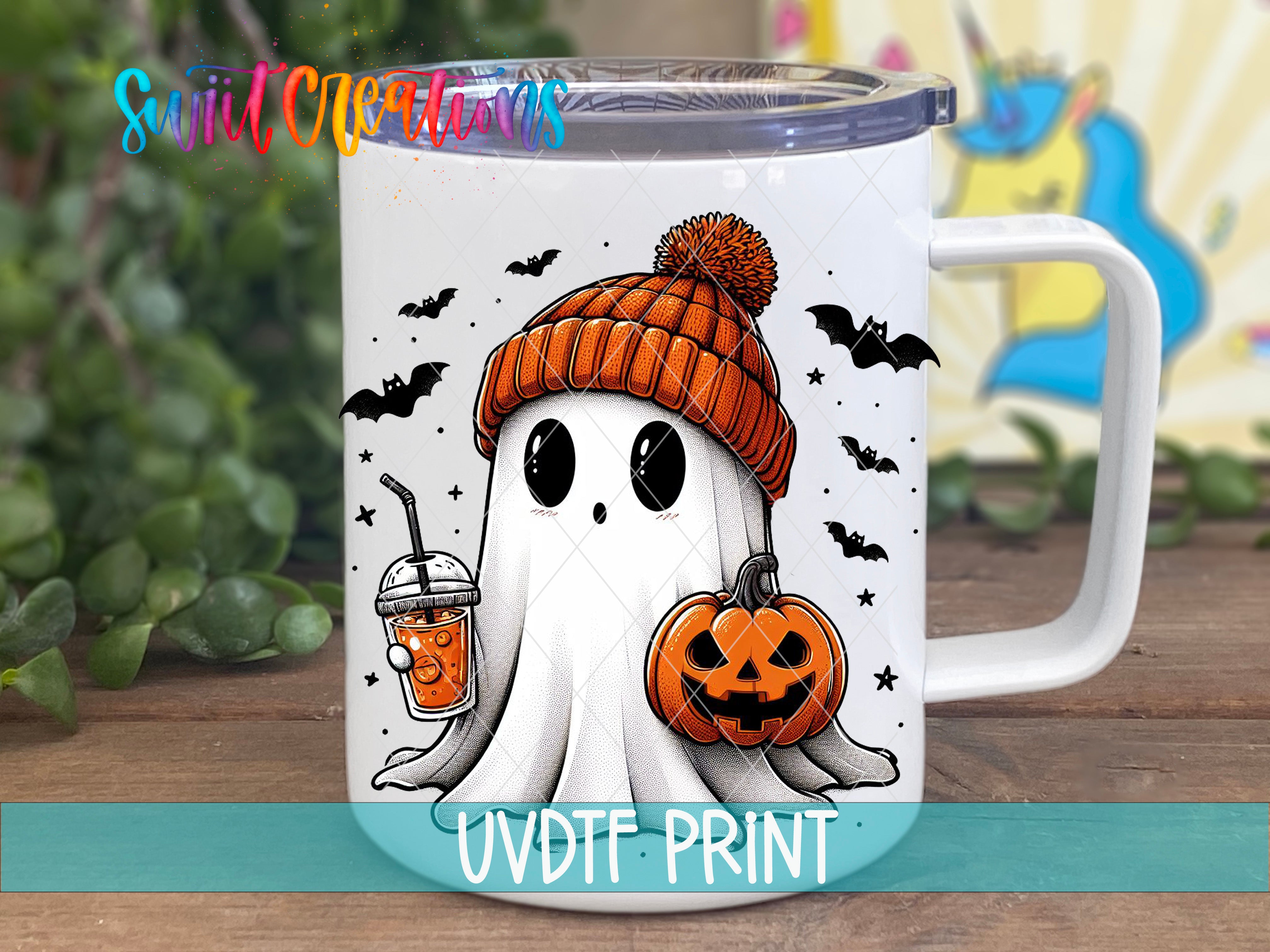 A mug with a Halloween-themed design featuring a ghost wearing a knit hat and holding a pumpkin, with bats and a pumpkin in the background.
