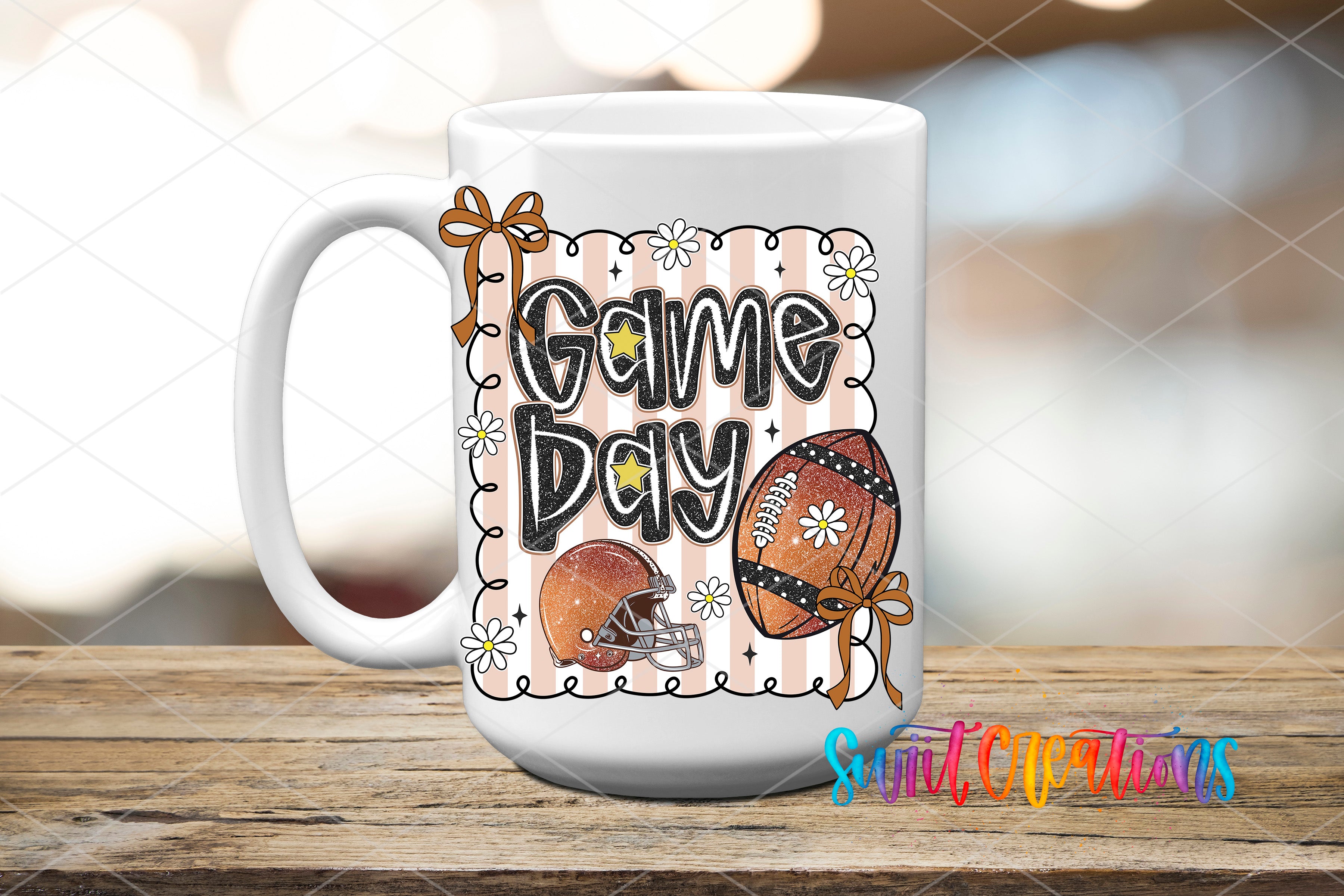 A white mug with a graphic design featuring a football, flowers, and the text "Game Day" on it, placed on a wooden surface.