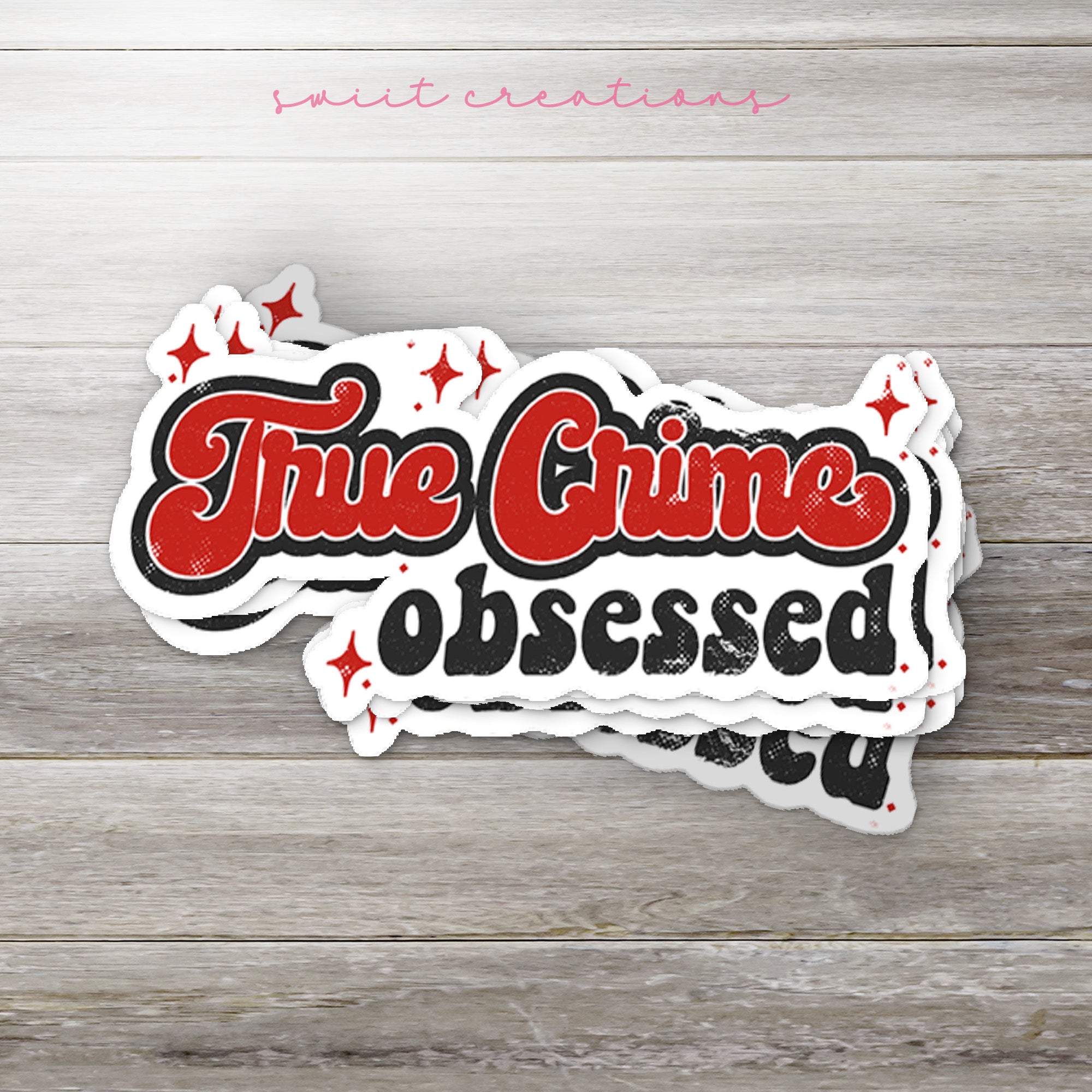 a white sticker with red and black lettering on it