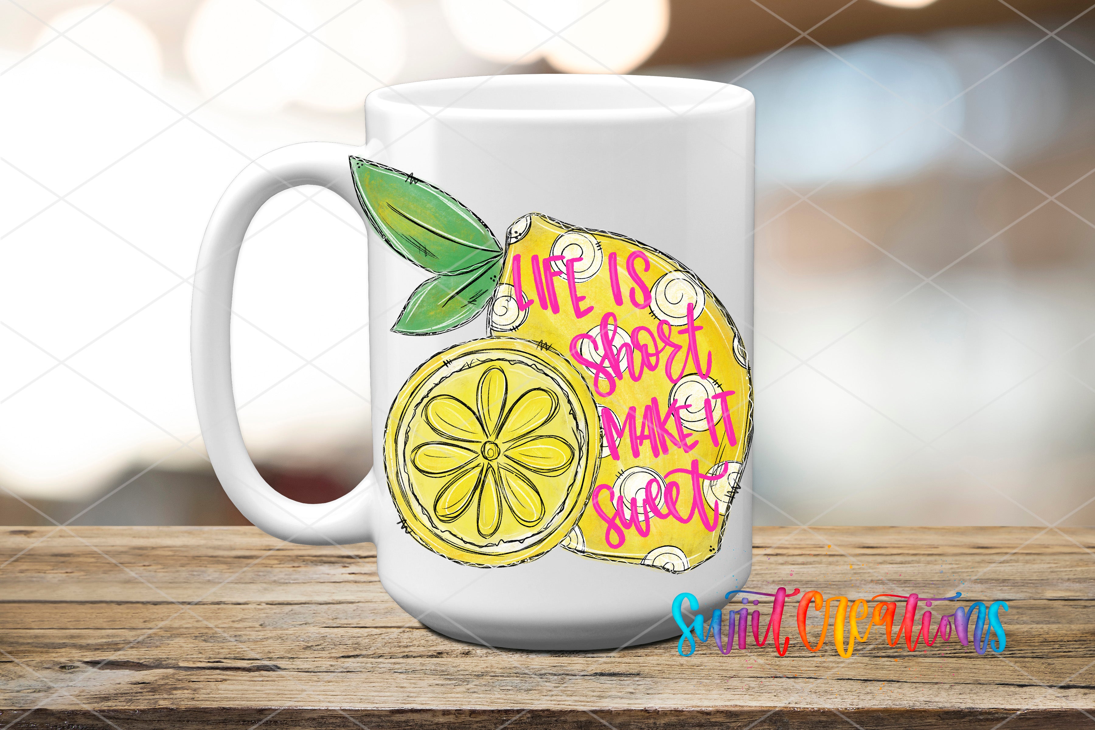 A white ceramic mug with a colorful illustration of a lemon slice and the text "Life is short, make it sweet" printed on it.