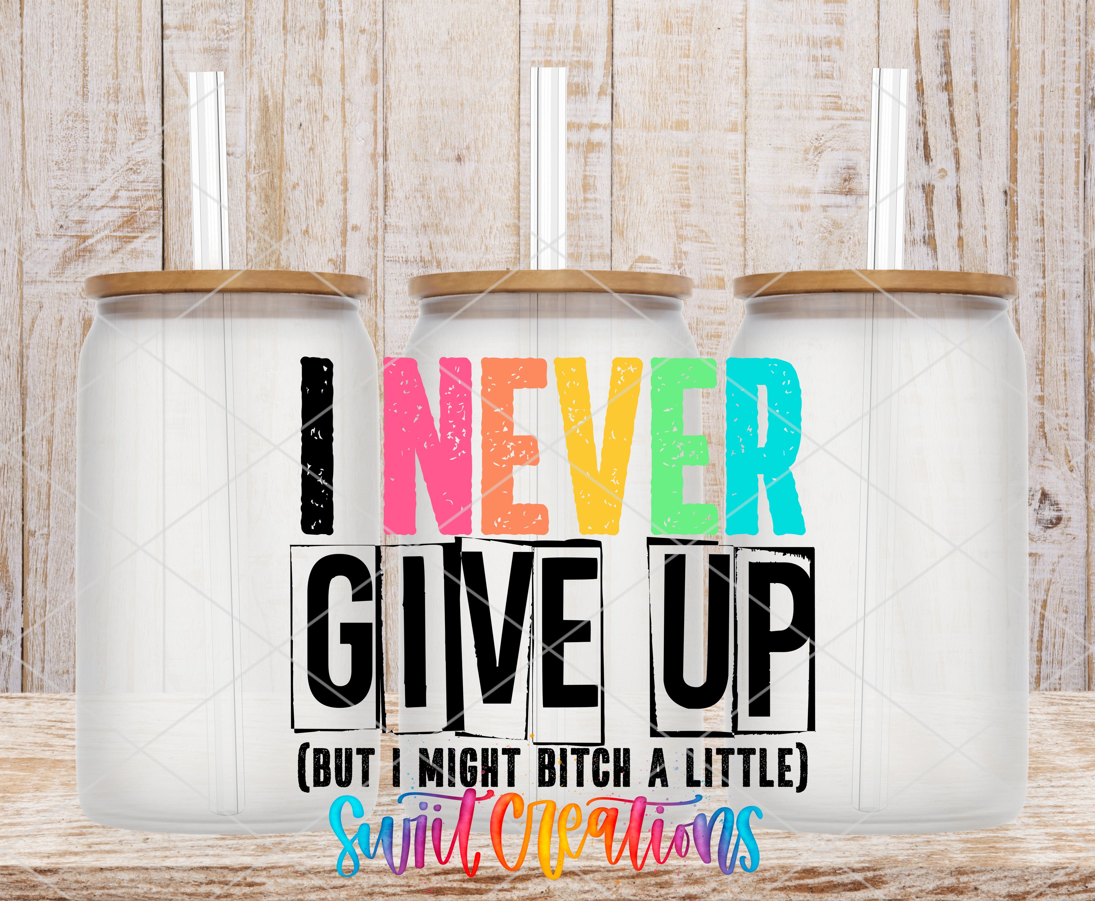 three glass jars with lids, each containing a straw. The jars are arranged in a row, and the text on the jars reads "I NEVER GIVE UP (BUT I MIGHT BITCH A LITTLE)".