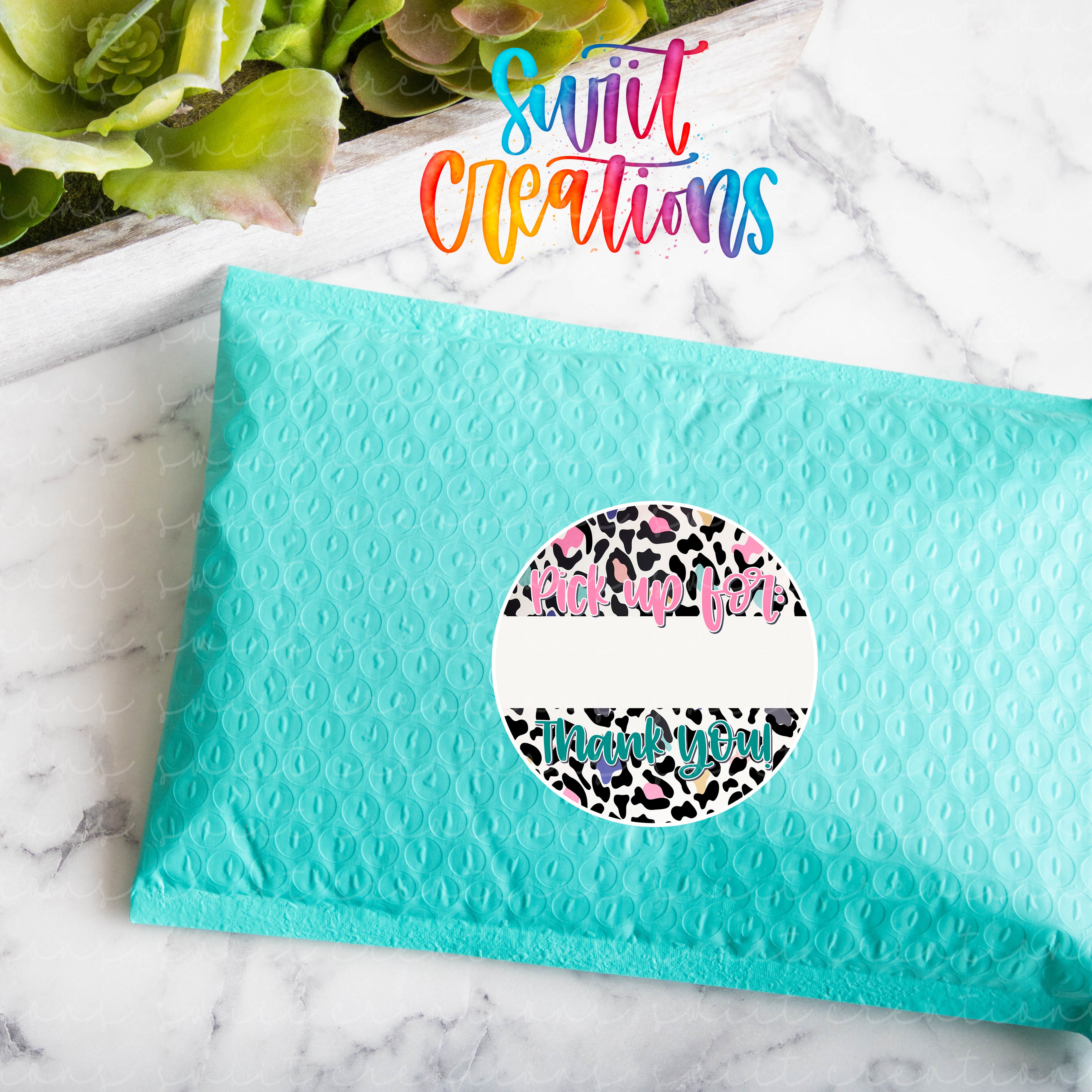 a blue envelope with a leopard print on it