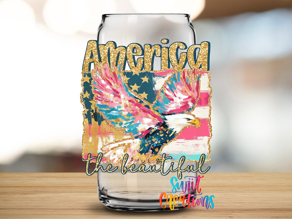 America The Beautiful Eagle Patriotic UV DTF transfer applied to a clear glass can from Swiit Creations