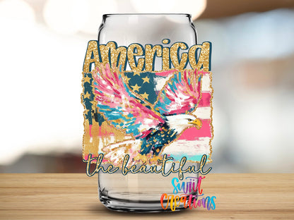 America The Beautiful Eagle Patriotic UV DTF transfer applied to a clear glass can from Swiit Creations