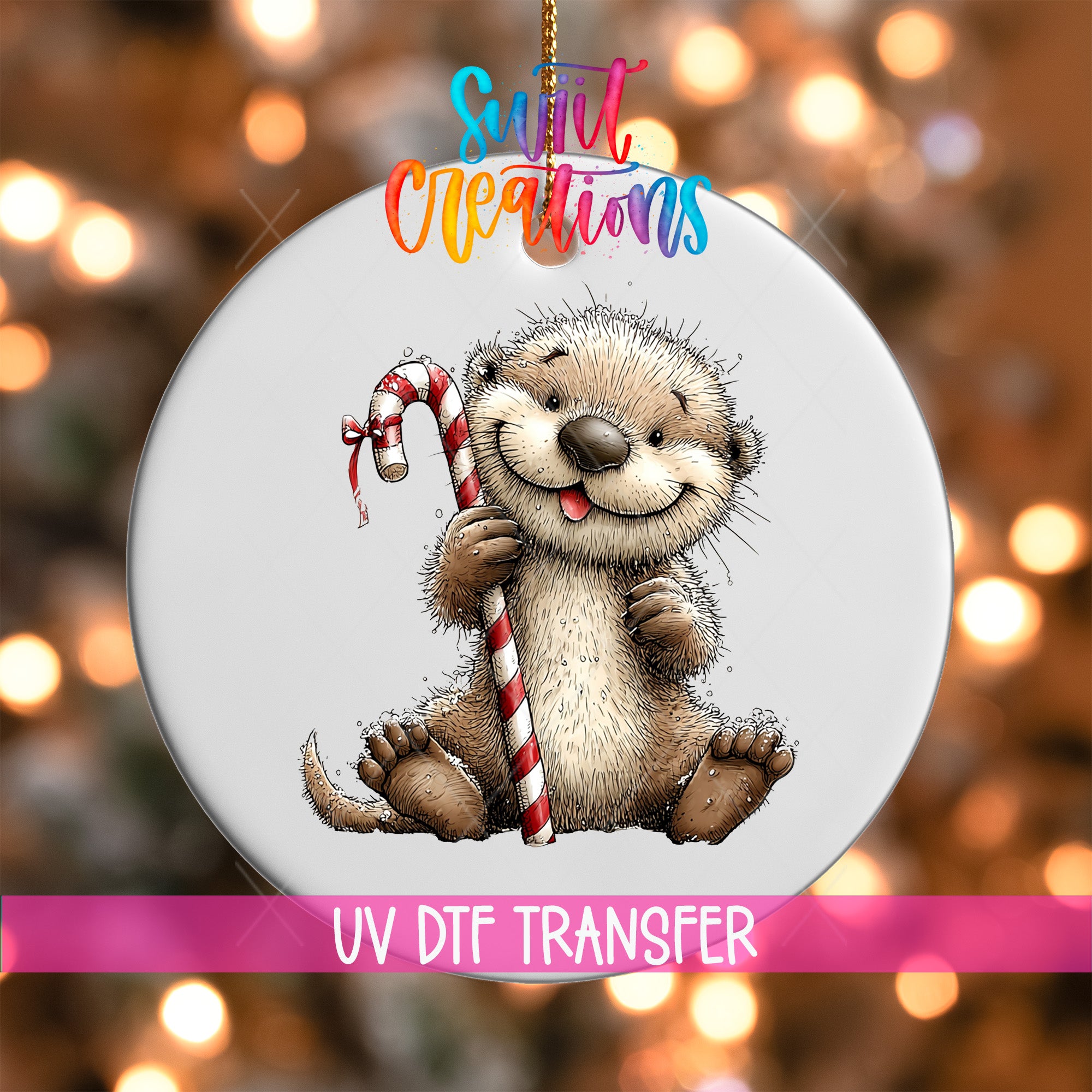 A round ornament featuring a cartoon image of an otter holding a candy cane.