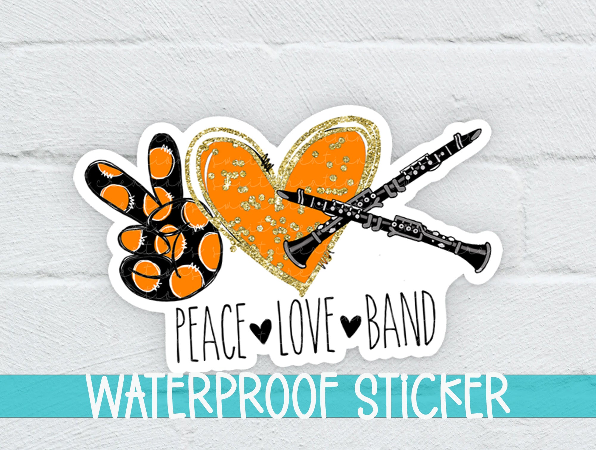 a sticker of a pair of flutes and a heart with peace love band written