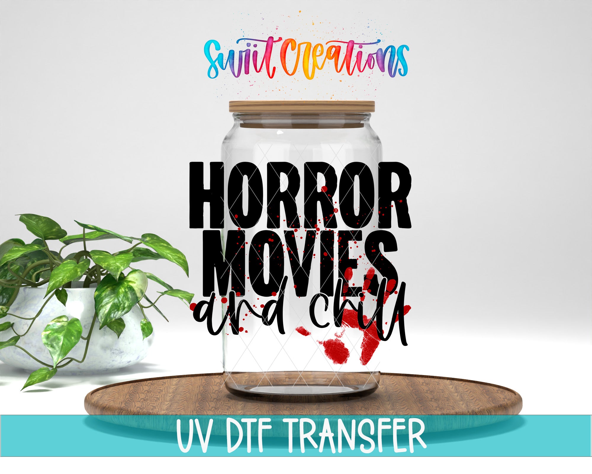 a glass jar with the text "HORROR MOVIES and chill" printed on it, along with a plant and a wooden tray in the background.