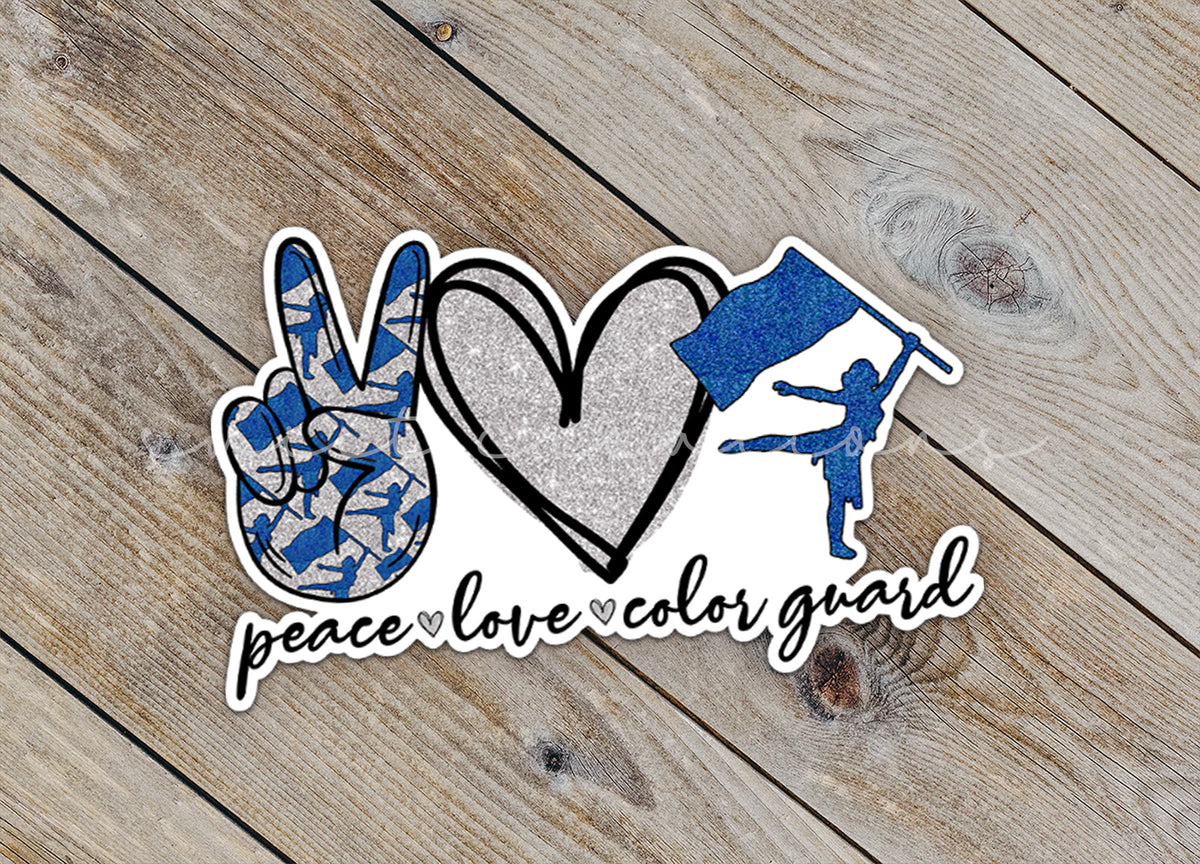 a peace love color guard sticker on a wooden surface