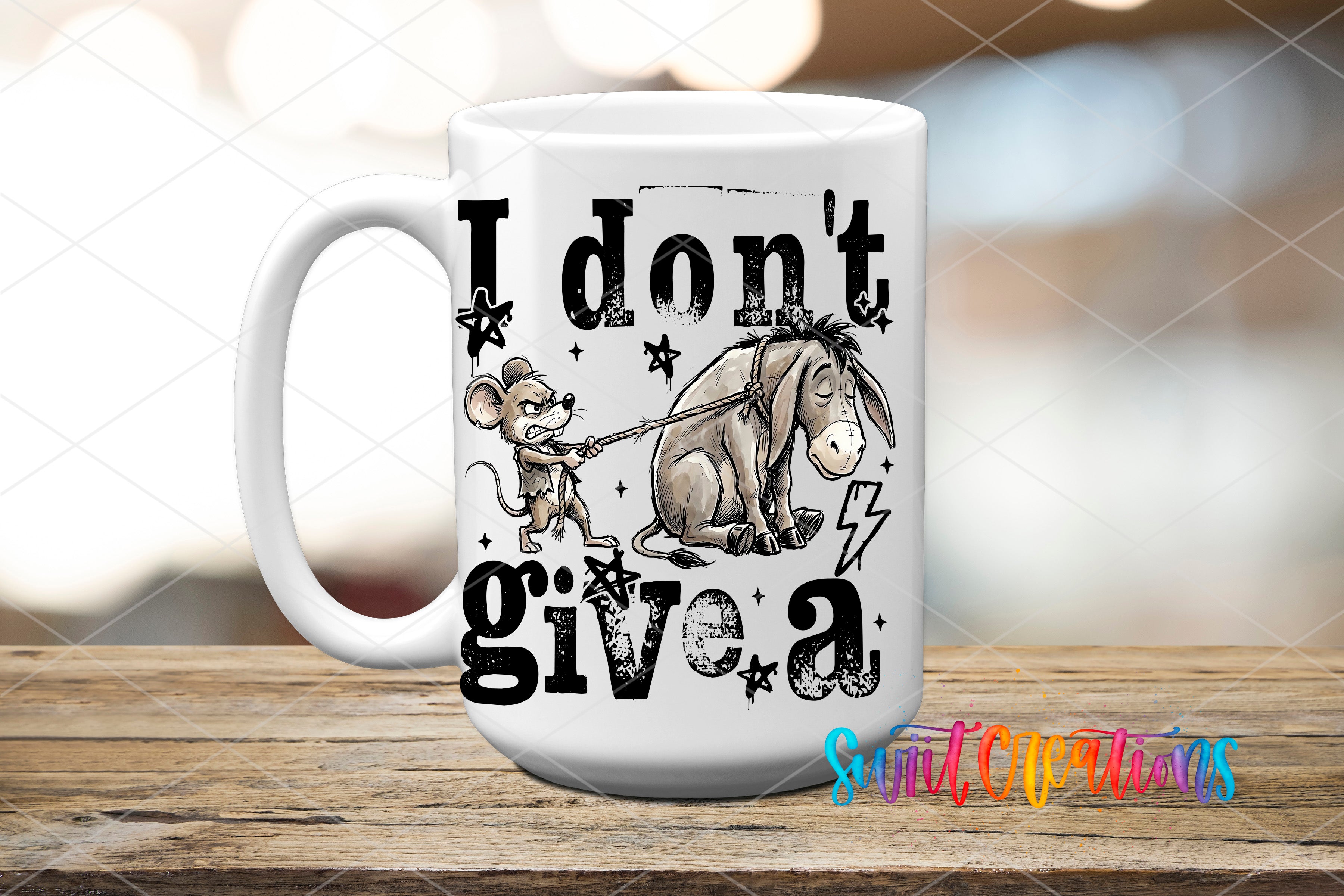 A white ceramic mug with a black and white illustration of Eeyore, a famous character from the Winnie the Pooh series, and a mouse. The mug has the text "I don't give a" printed on it.