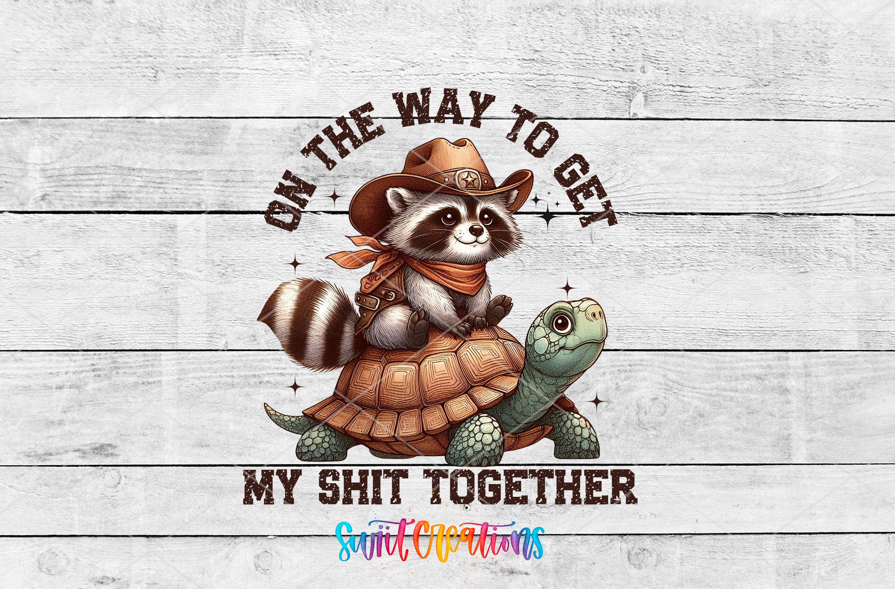 A raccoon wearing a cowboy hat sits atop a turtle, with the text "ON THE WAY TO GET MY SHIT TOGETHER" above them.