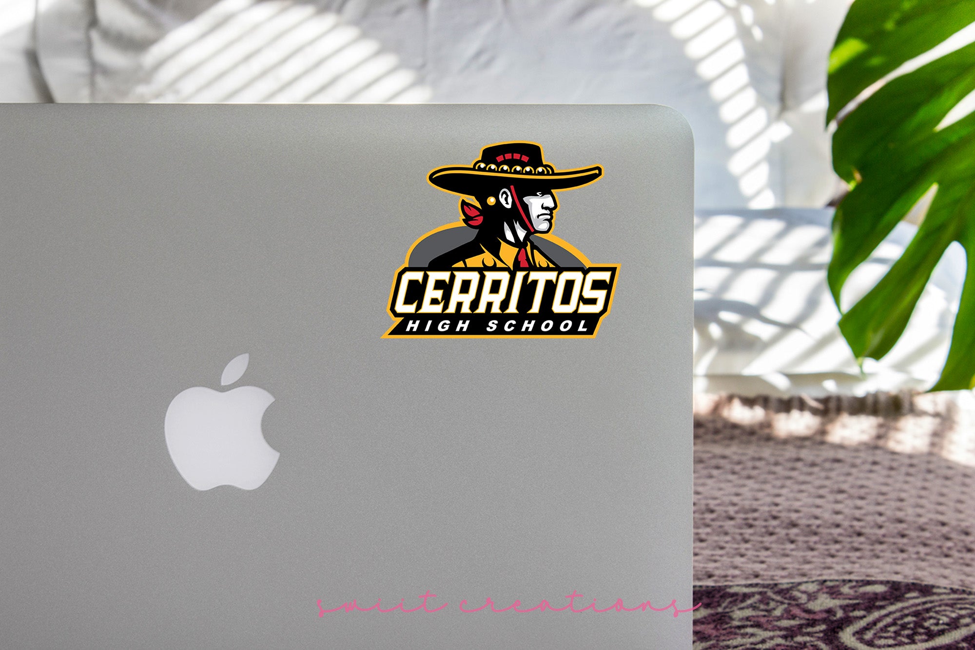 a laptop computer sitting on top of a table