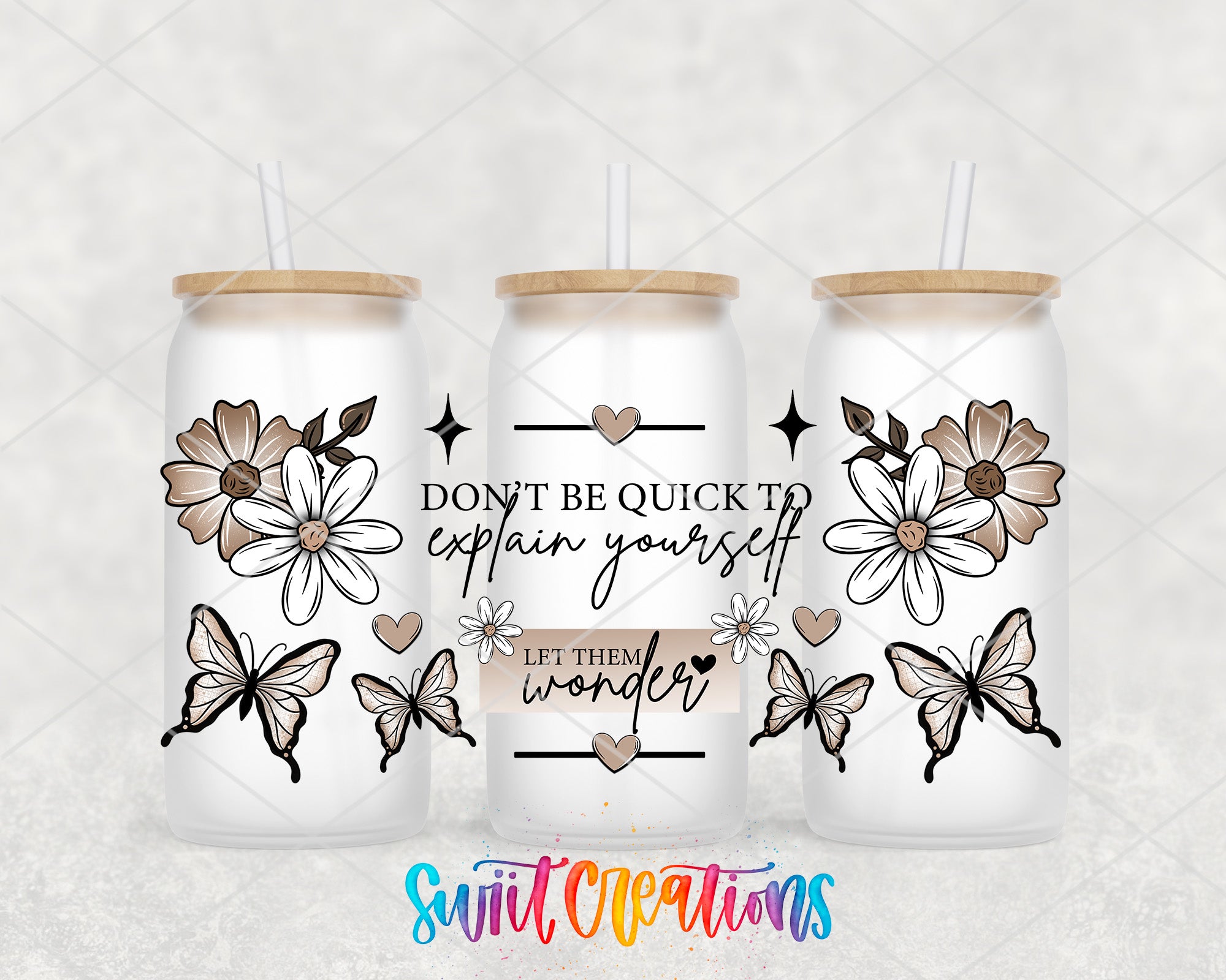 three white glass tumblers with floral designs and butterflies. The text on the tumblers reads "Don't be quick to explain yourself, let them wonder".