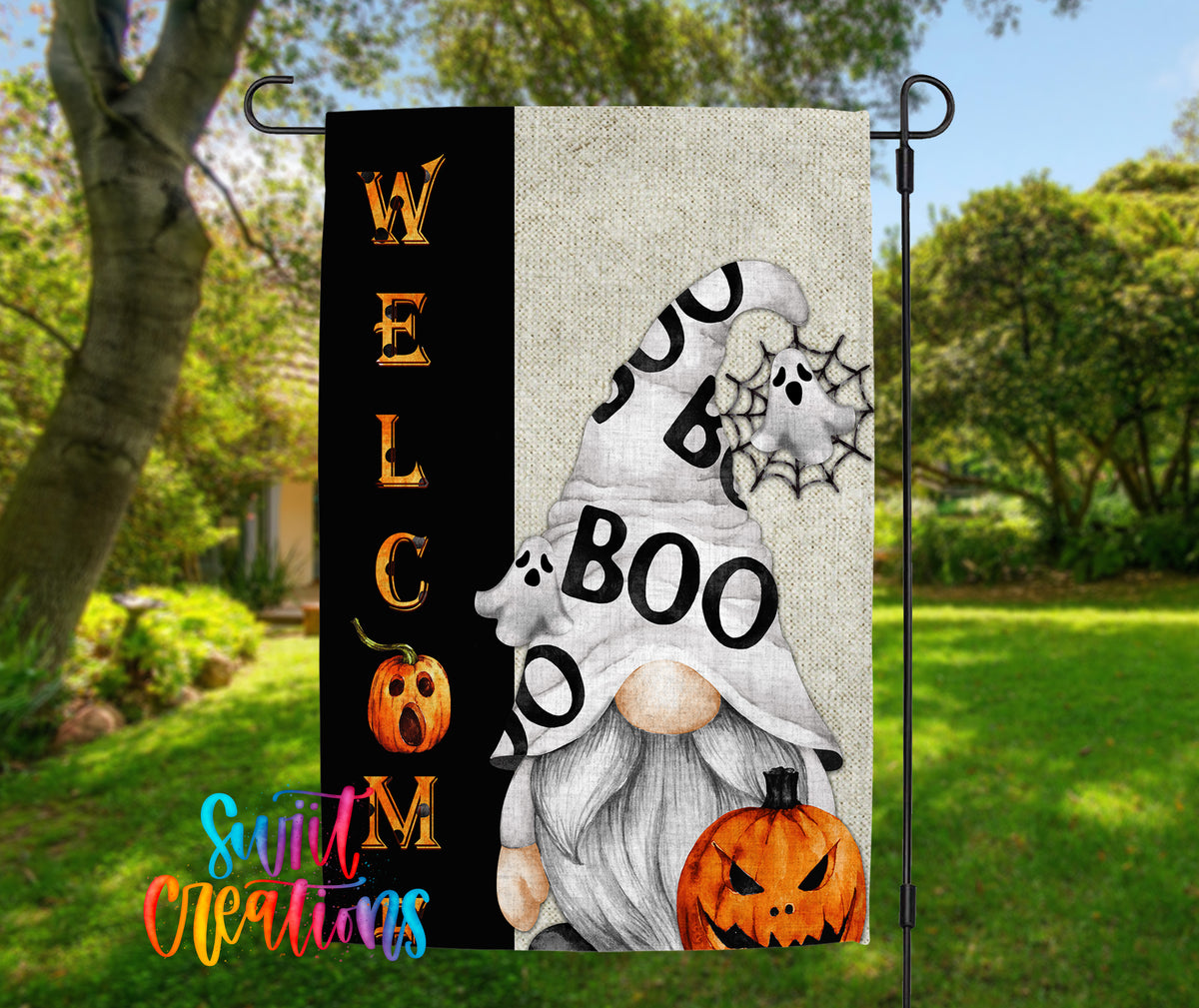 A welcome sign featuring a gnome and a pumpkin, with the word "BOO" prominently displayed.