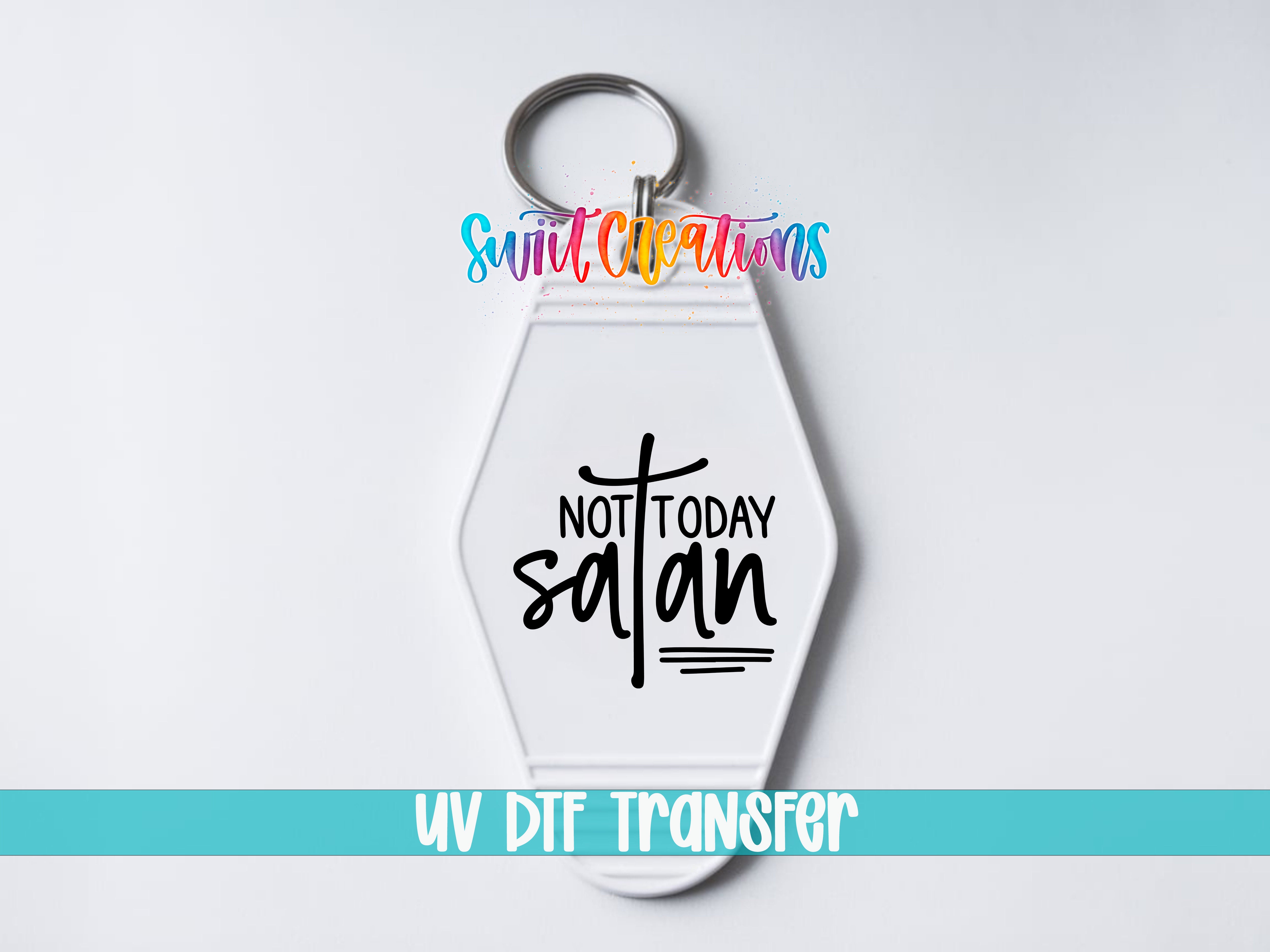 A keychain with a message printed on it.