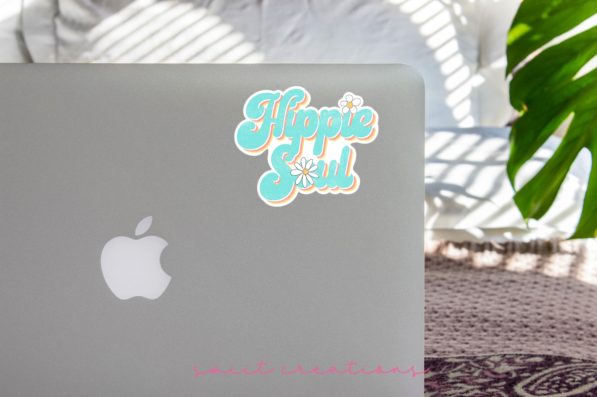 a laptop computer sitting on top of a table