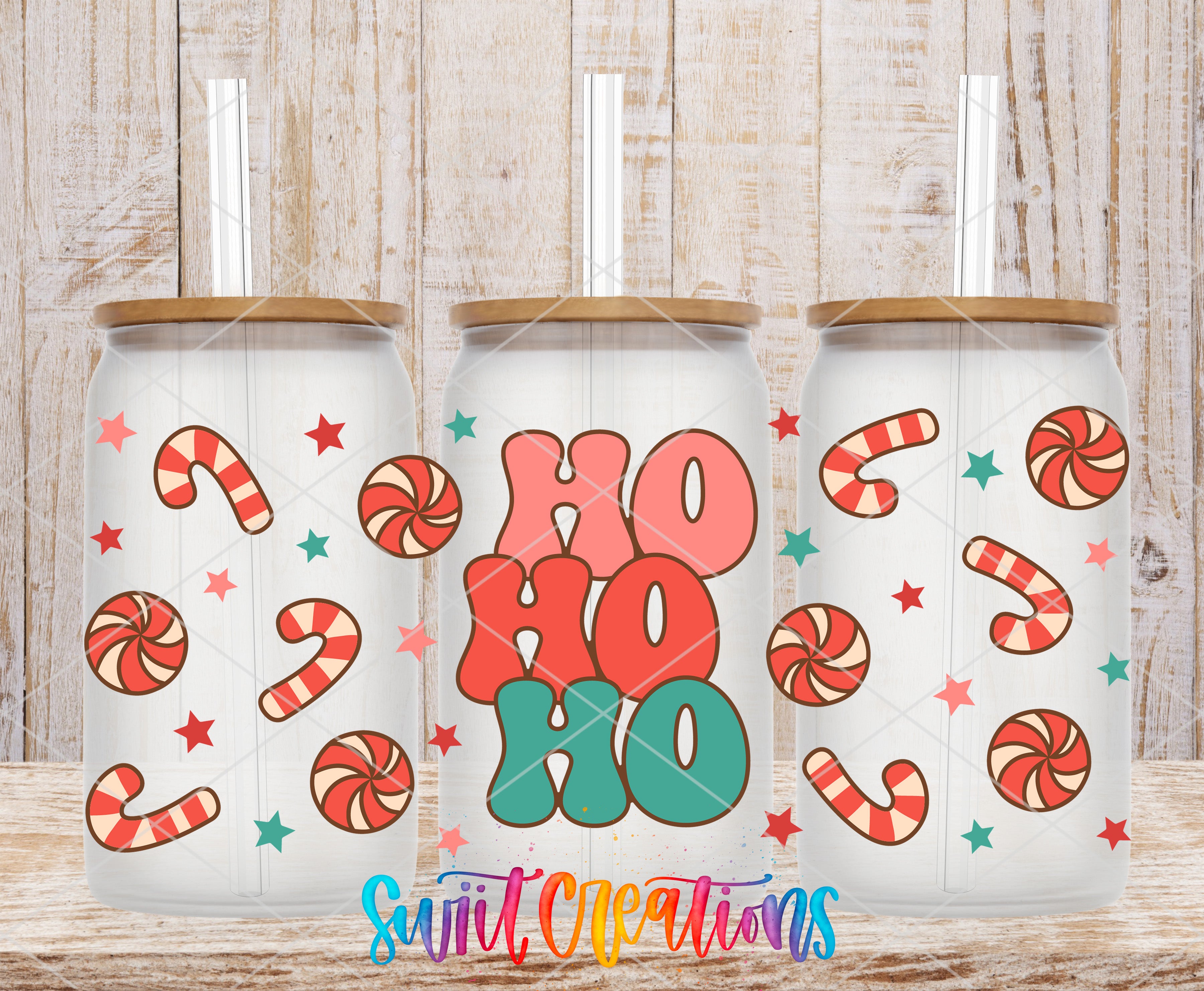 A collage of three glass tumblers with a festive design featuring candy canes, stars, and the text "HO HO HO" in a playful, colorful style.