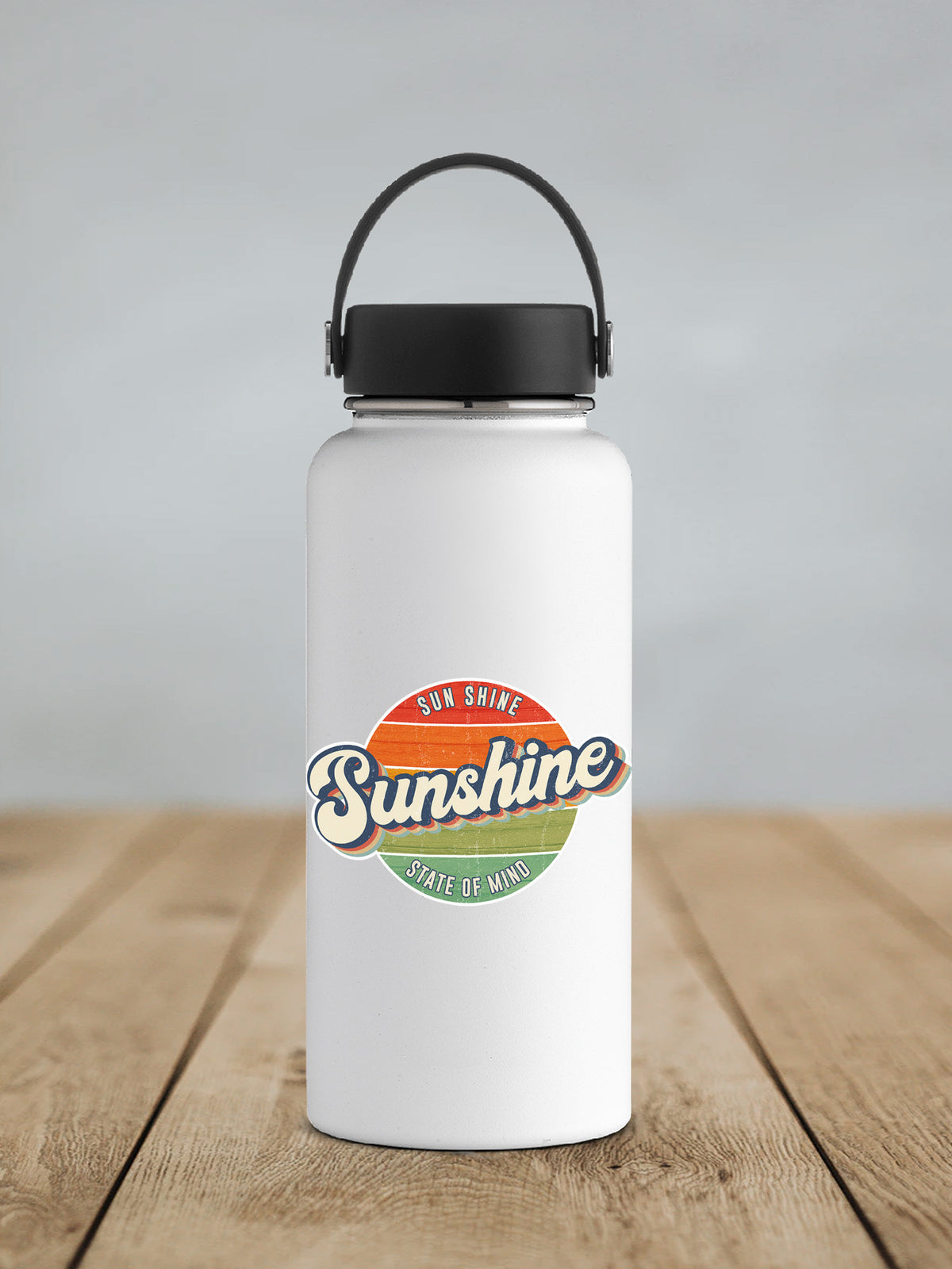 a white water bottle sitting on top of a wooden table