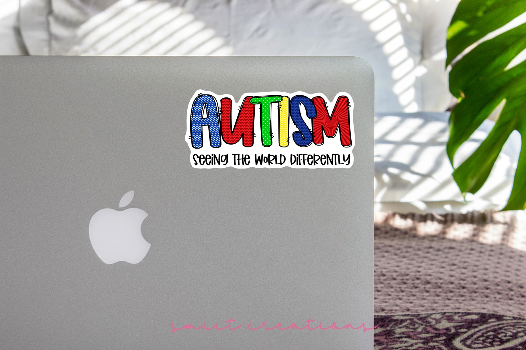 a laptop computer sitting on top of a table