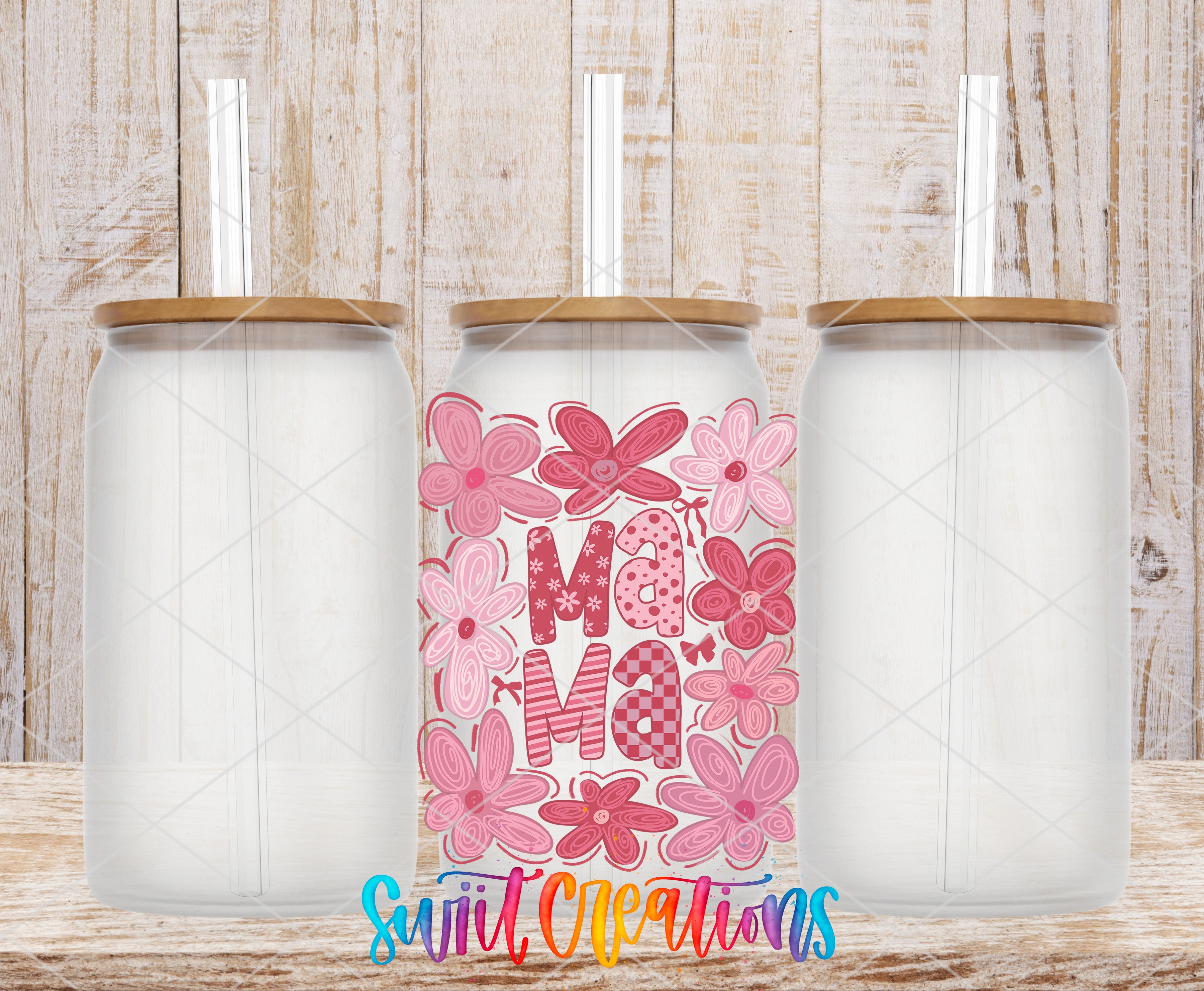 three clear glass jars with wooden lids, each with a straw sticking out of the top. The jars are arranged in a row, and there is a colorful design on the front of one of the jars that says "Mama Mama".